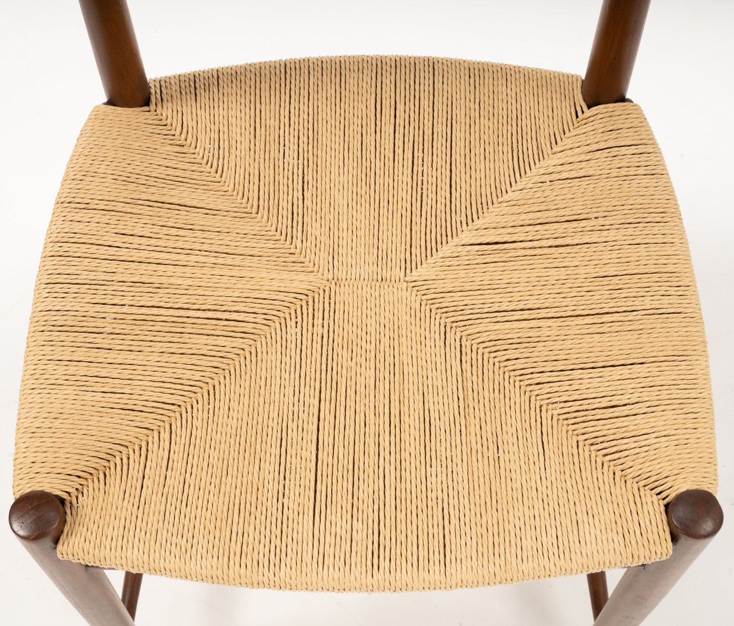 Close-up top view of tightly woven natural fiber seat with dark teak frame on Hvidt & Molgaard Model 316 chair pair