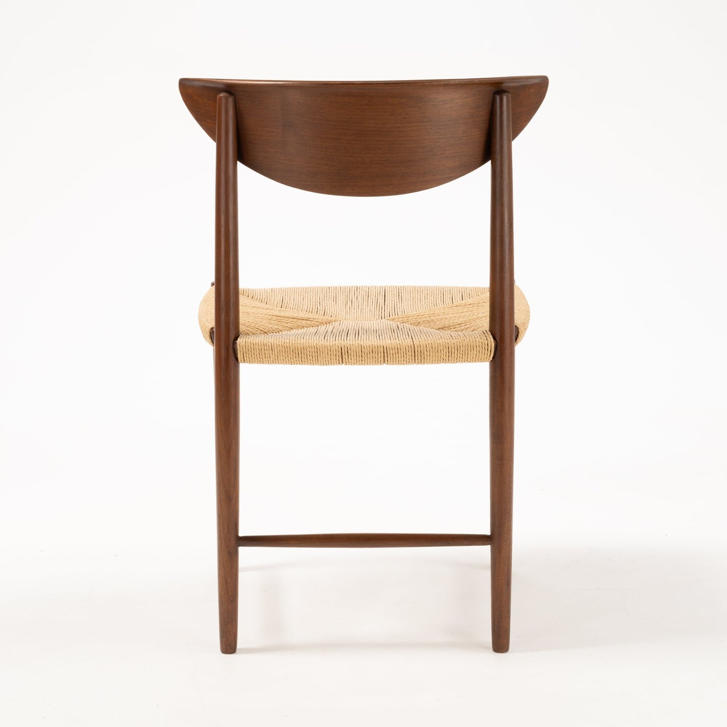 Rear view of Hvidt & Molgaard Model 316 chair showing sculpted crescent teak backrest and woven natural fiber seat