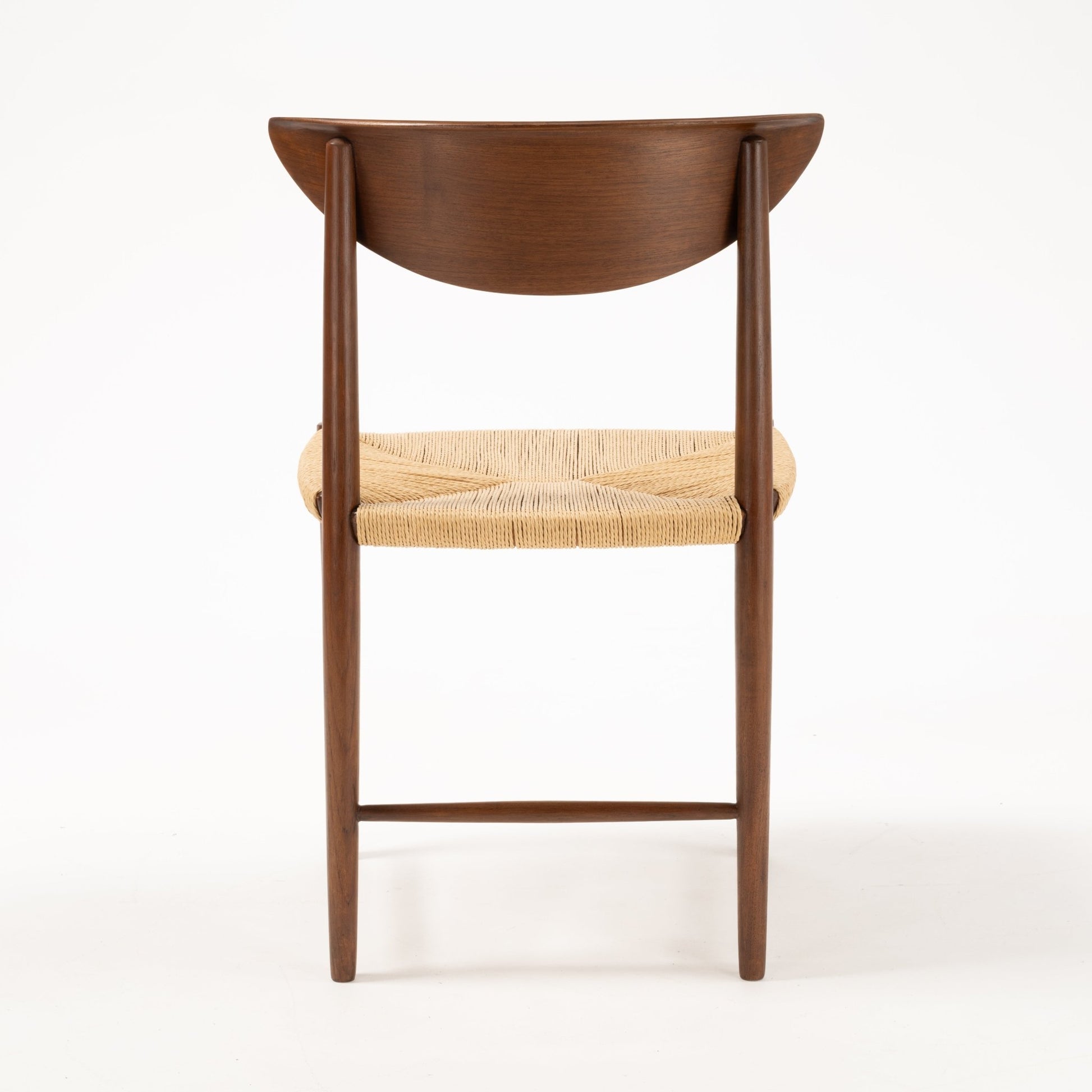 Rear view of Hvidt & Molgaard Model 316 chair showing sculpted crescent teak backrest and woven natural fiber seat