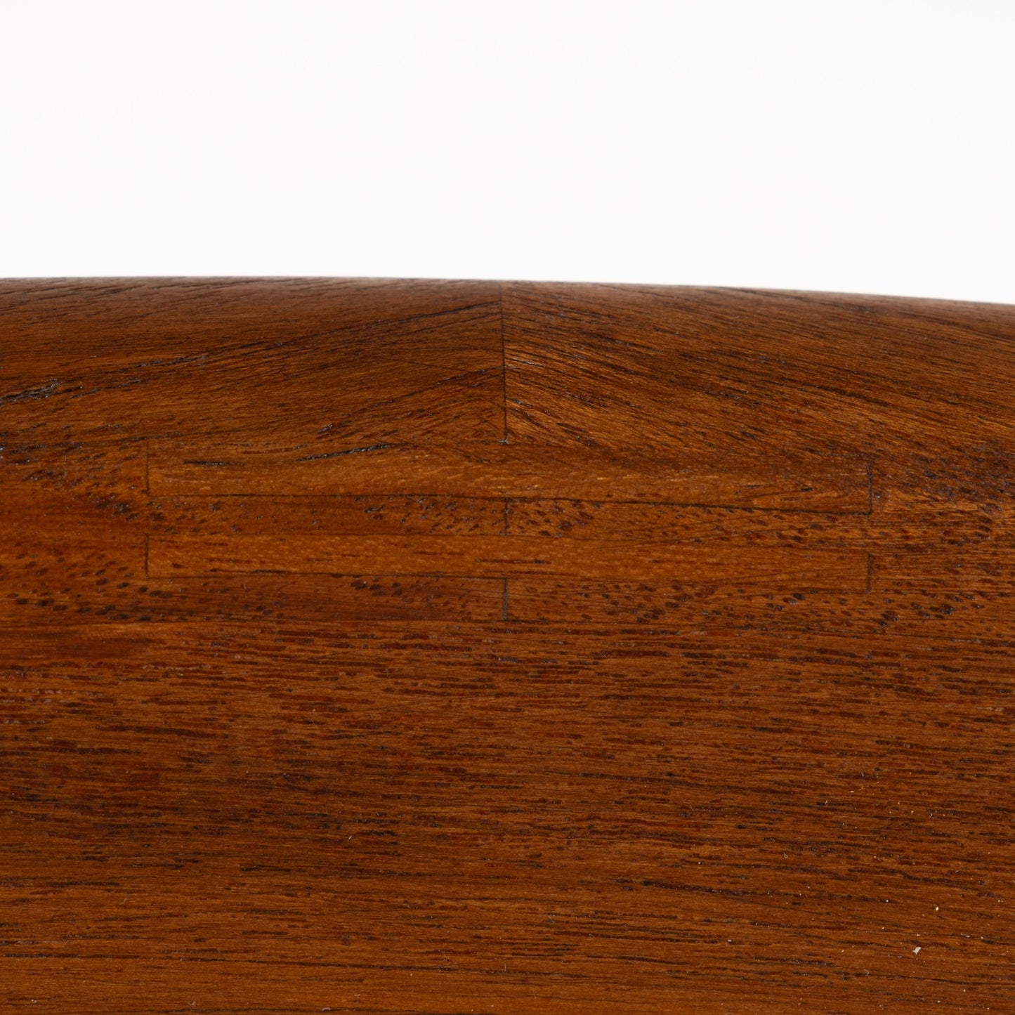 Close-up of smooth teak wood grain and precise joinery detail on the backrest of Hvidt & Molgaard Model 316 chair
