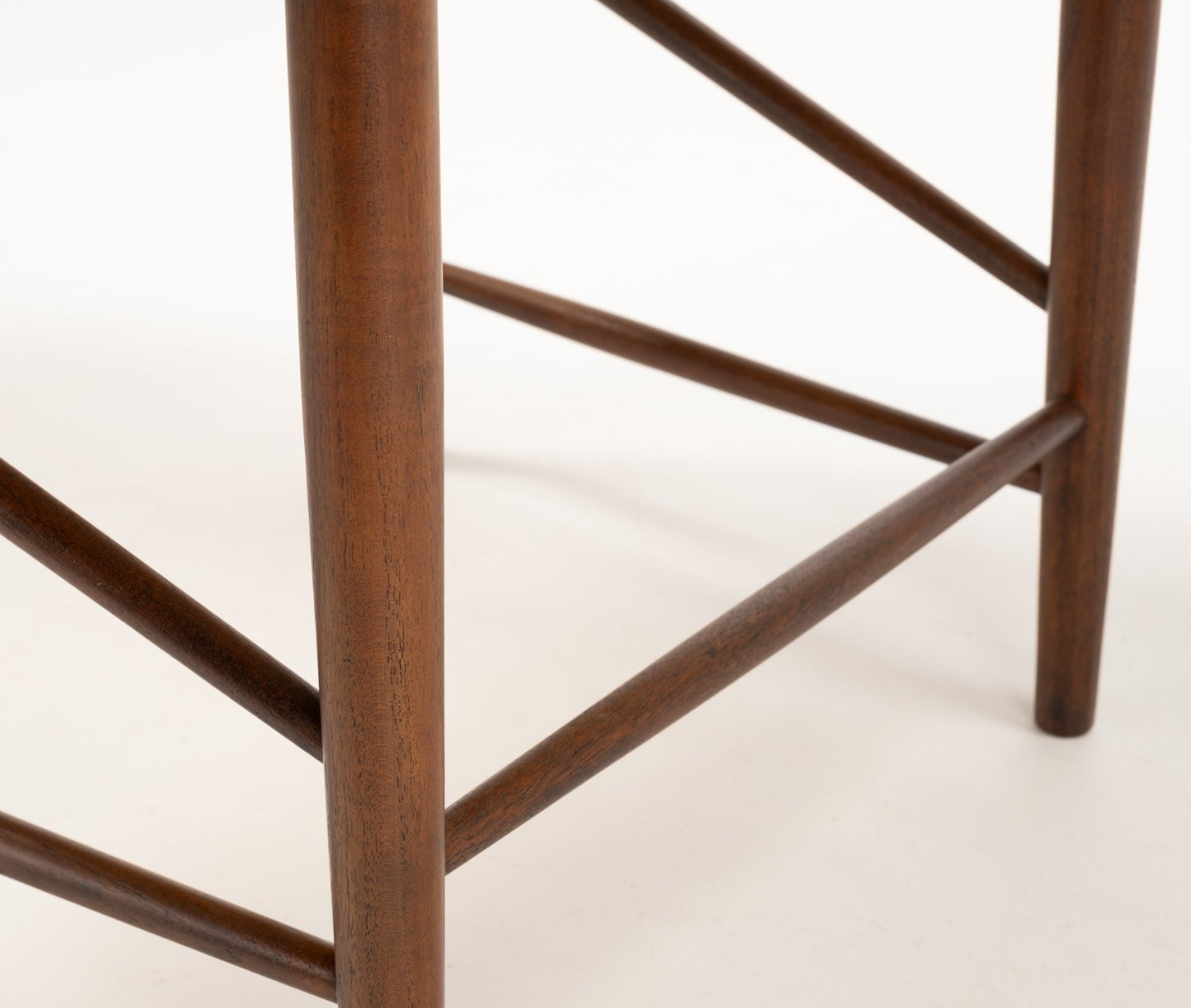 Close-up of tapered solid wood legs and rounded stretcher details on Hvidt & Molgaard Model 317 chair frame