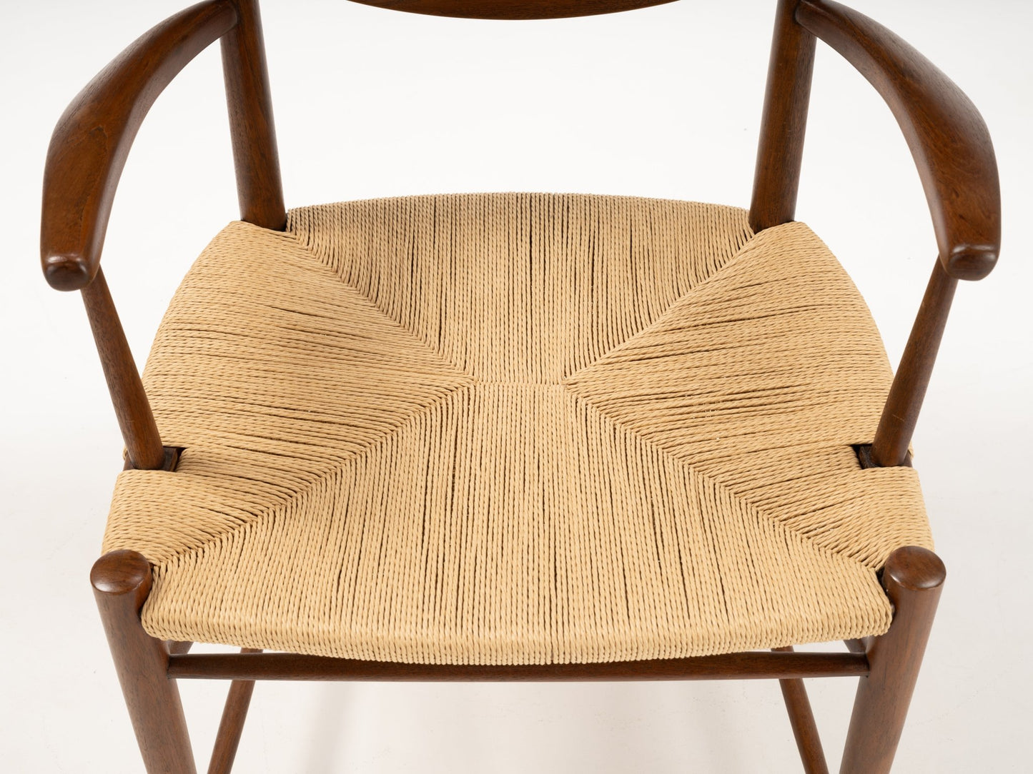 Top view of Hvidt & Molgaard Model 317 chair showing woven cord seat with solid wood frame and curved armrests
