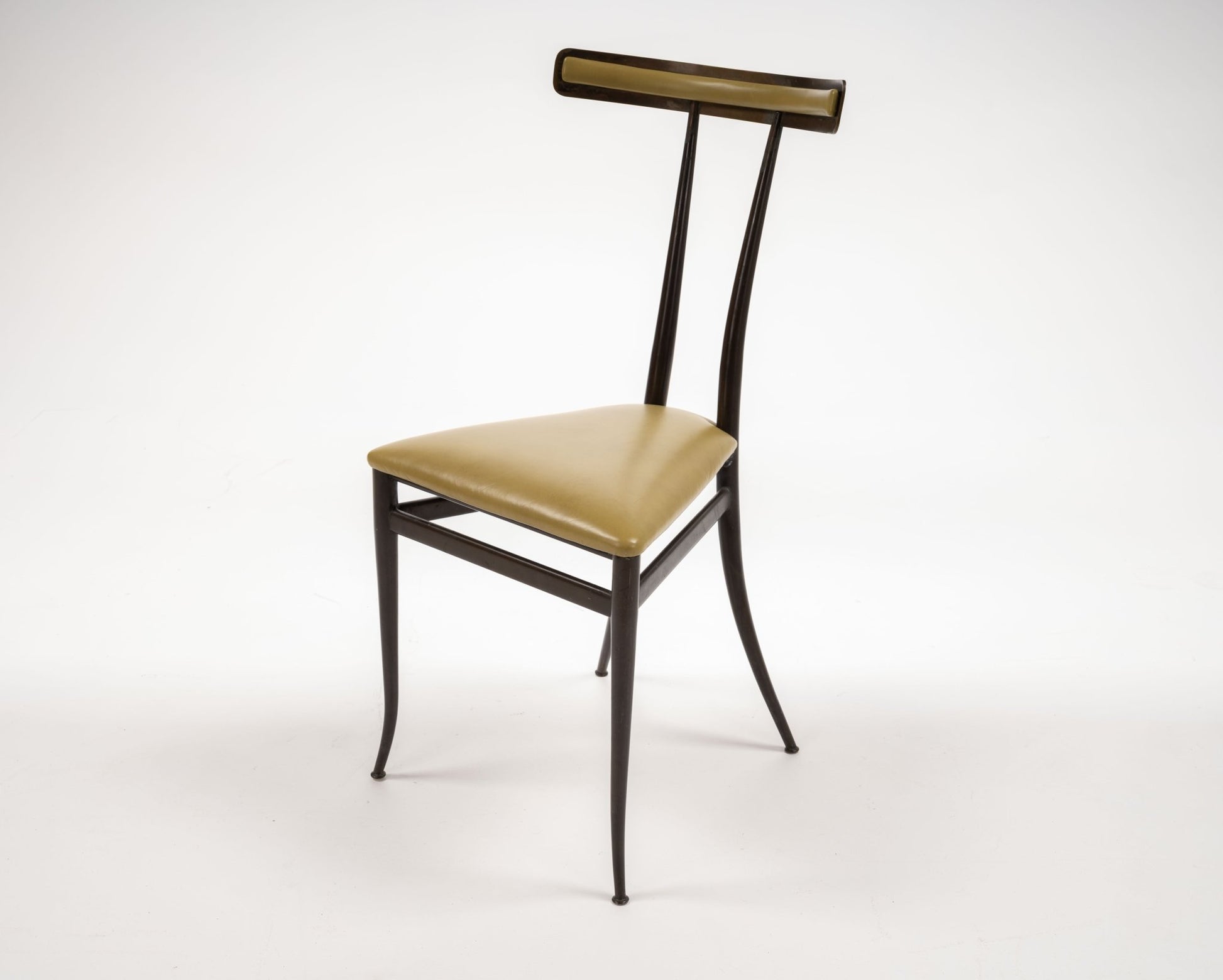 Italian brass Klismos chair with sculpted backrest and supple chartreuse leather triangular seat on slender legs