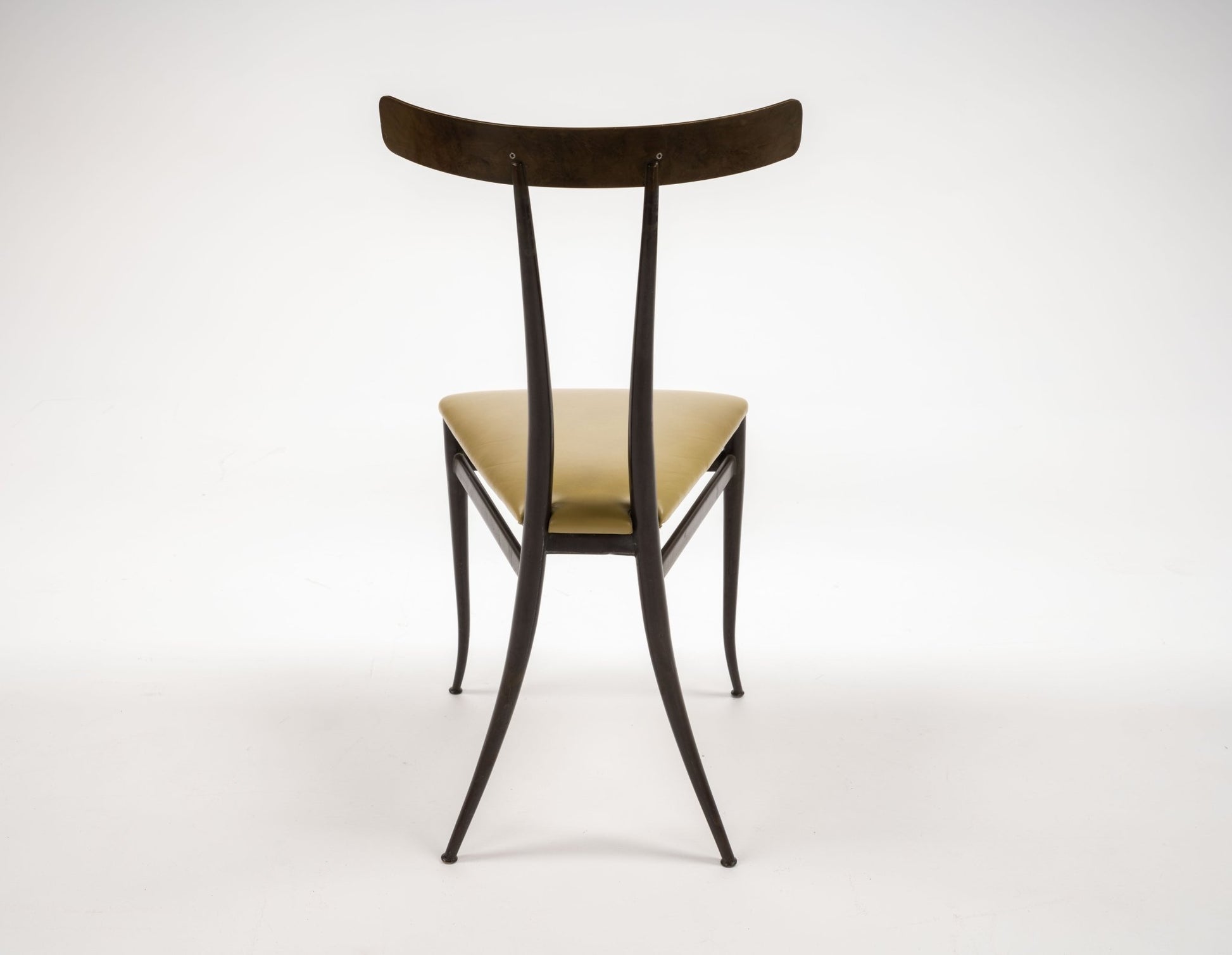 Italian mid-century brass Klismos chair with sculptural curved backrest and chartreuse leather upholstered triangular seat