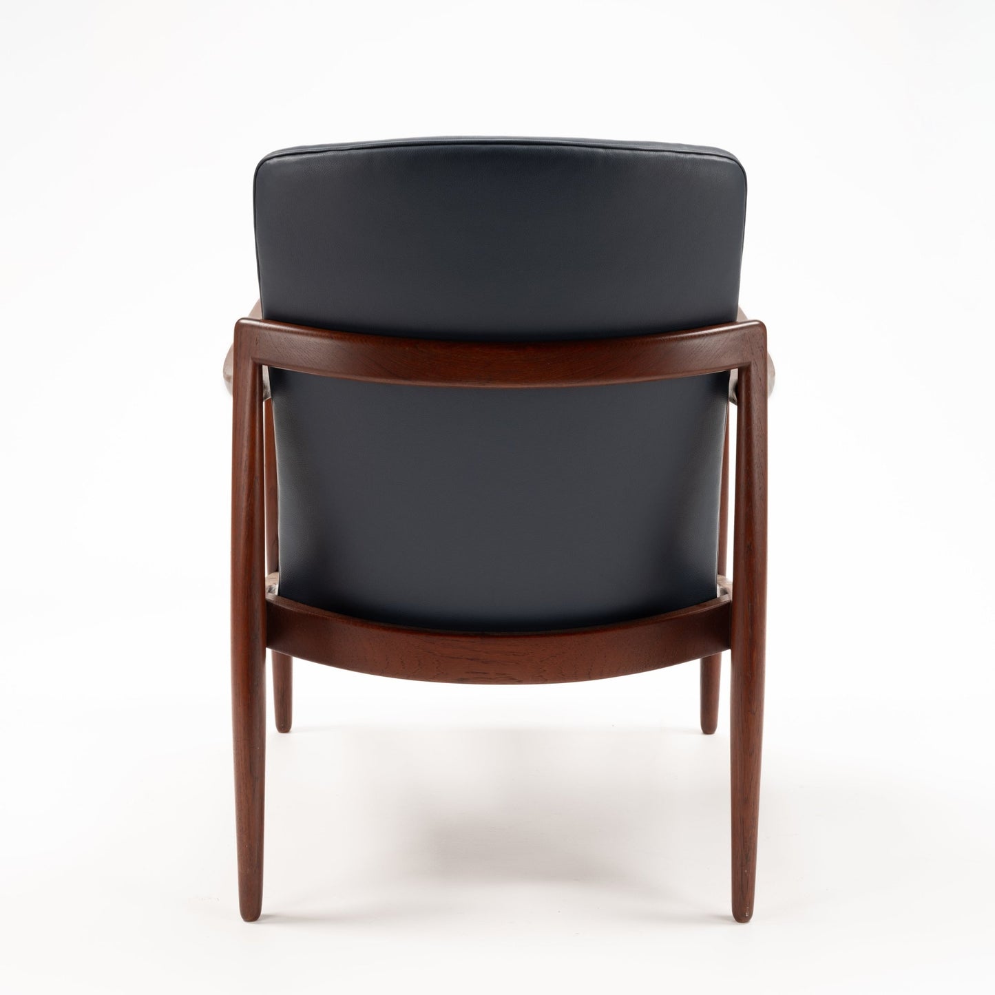 Jacob Kjaer Adjustable Lounge Chair rear view with black leather backrest and rich rosewood frame with tapered legs in mid century modern furniture style