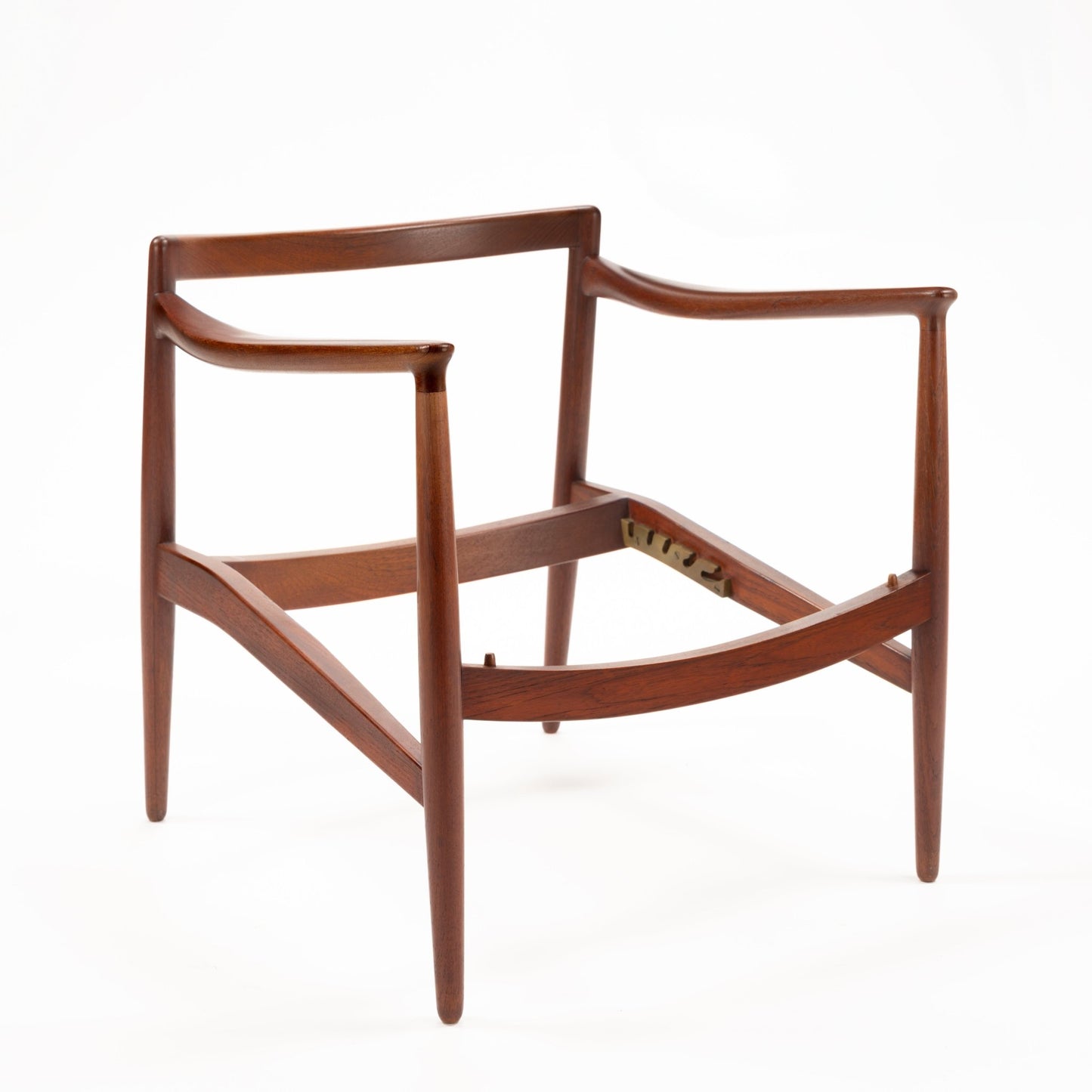 Jacob Kjaer Adjustable Lounge Chair showing an exposed warm wood frame with curved arms and tapered legs in mid century modern furniture style