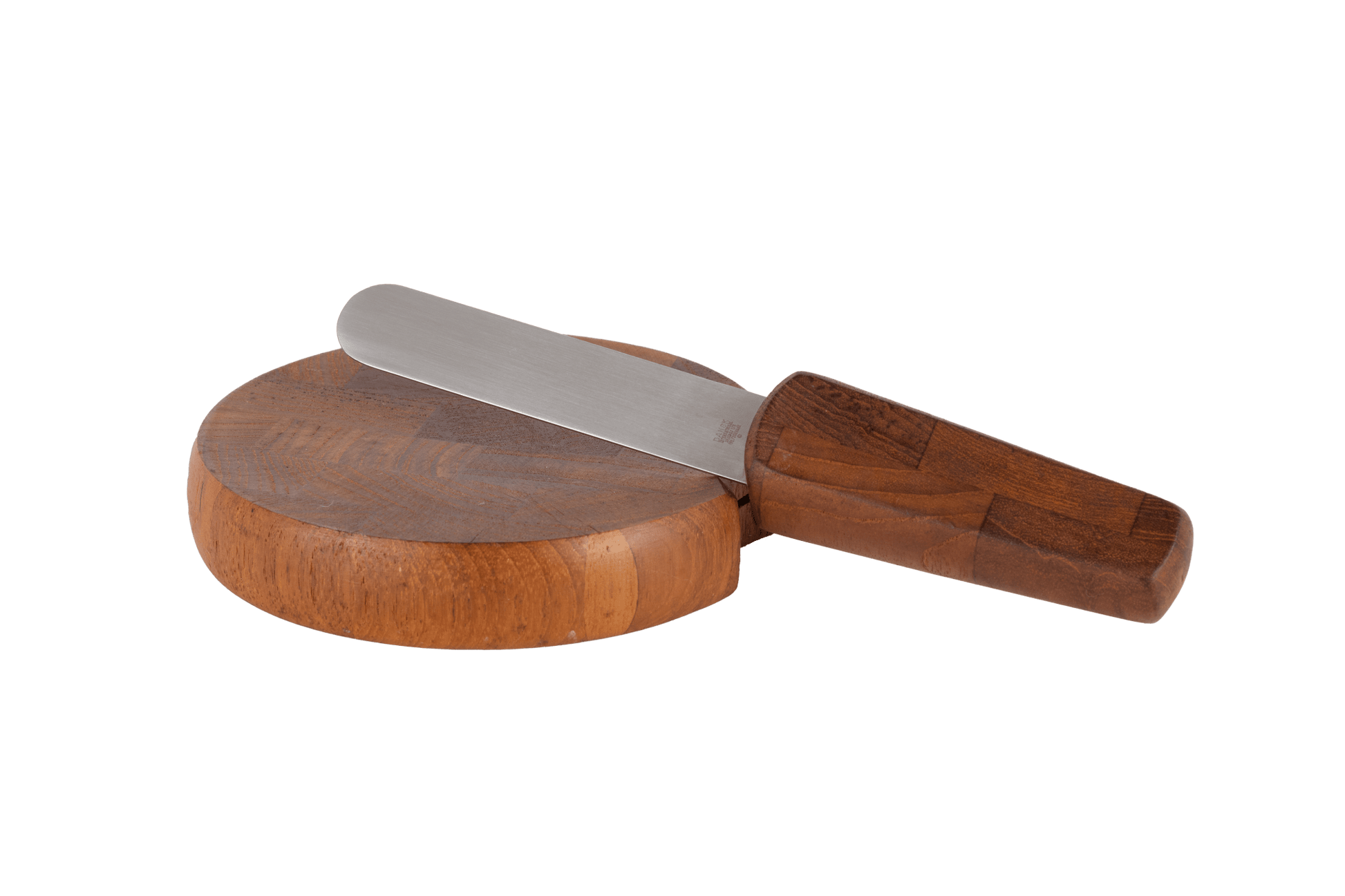 Round mid-century modern teak cutting board with integrated knife featuring solid wood handle, designed by Jens Quistgaard.
