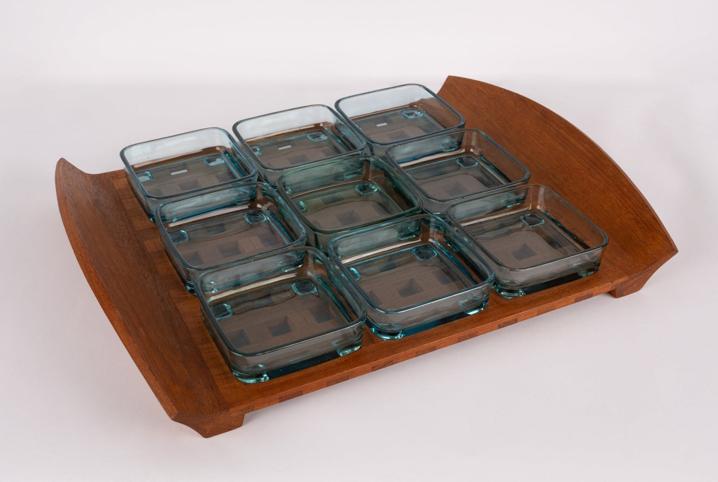 1960s Jens Quistgaard teak lattice serving tray with nine square glass inserts and curved handles