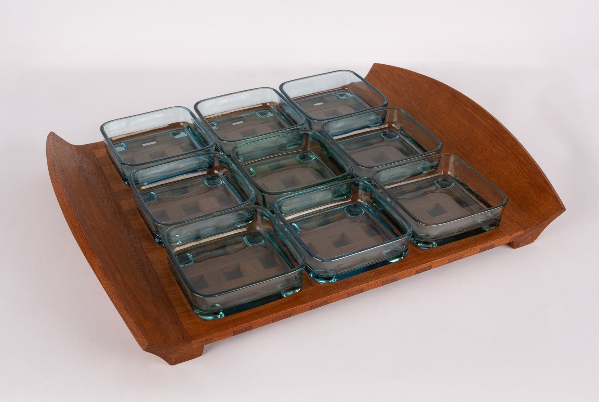 1960s Jens Quistgaard teak lattice serving tray with nine square glass inserts and curved handles