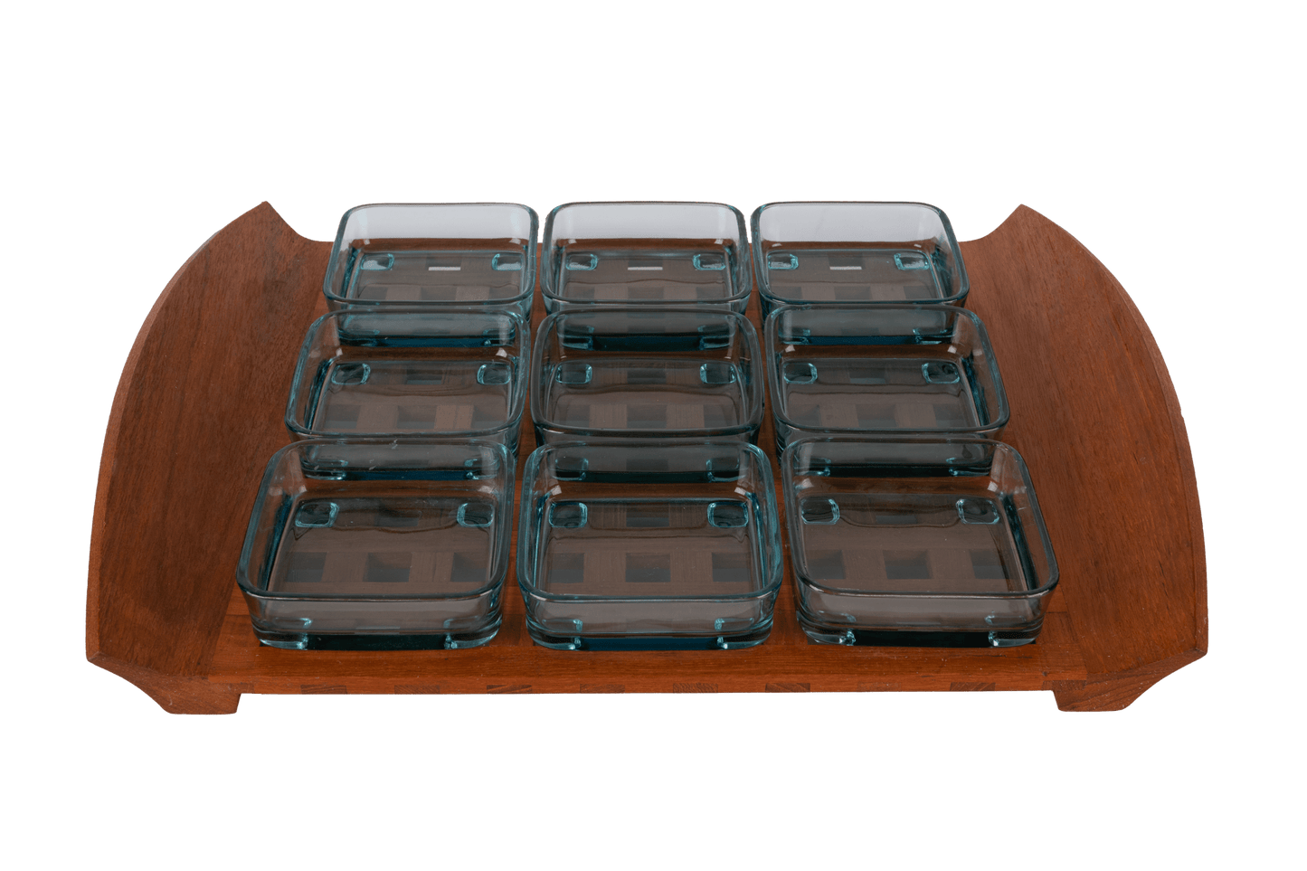 Mid-century modern Jens Quistgaard teak lattice serving tray with nine square glass bowls in a grid pattern.