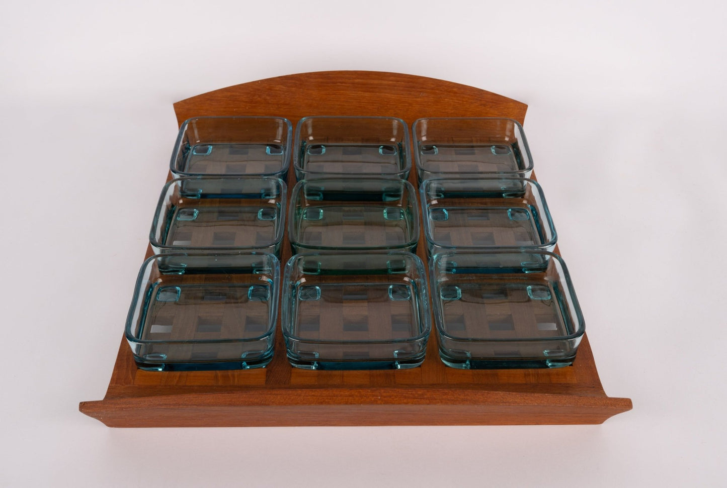 Jens Quistgaard teak lattice serving tray with nine square blue glass inserts, 1960s Danish modern design.