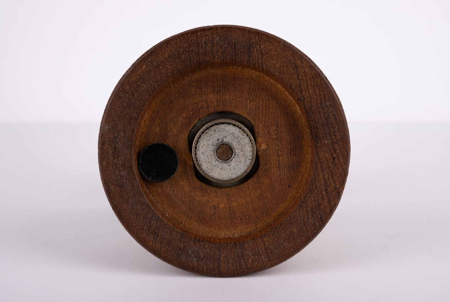 Bottom view of Jens Quistgaard teak peppermill with metal grinding mechanism from the 1950s by Dansk Denmark