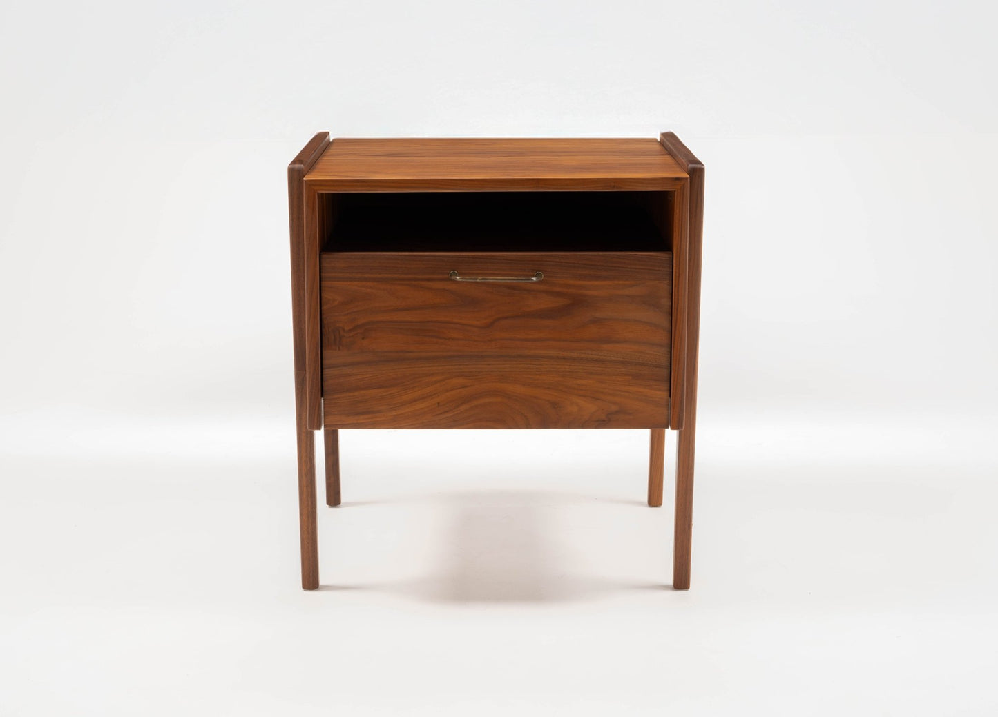 Pair of Jens Risom walnut bedside tables with open top compartment and fall-front lower drawer, 1960s design
