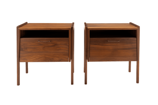 Pair of mid-century modern walnut bedside tables by Jens Risom with open upper compartments and fall-front drawers