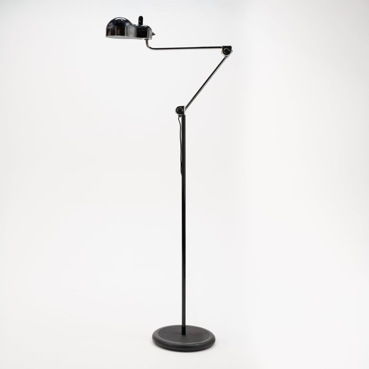 Joe Colombo Chrome Topo Floor Lamp with polished chrome twin dome shade articulated black arm slender stem and round weighted base in mid century modern lighting