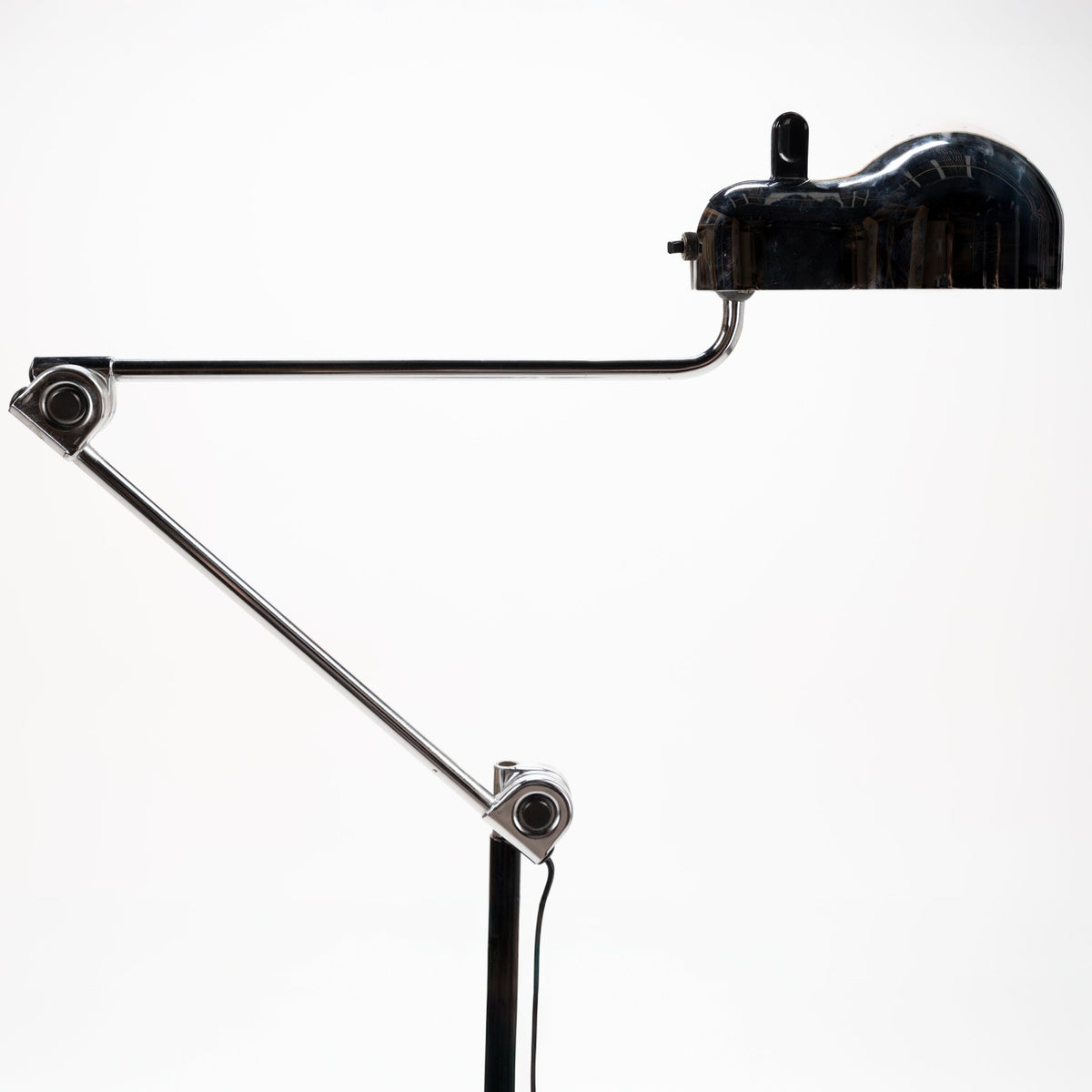 Joe Colombo Chrome Topo Floor Lamp with glossy black dome shade articulated chrome arms pivot joints and slim black stem in mid century modern lighting