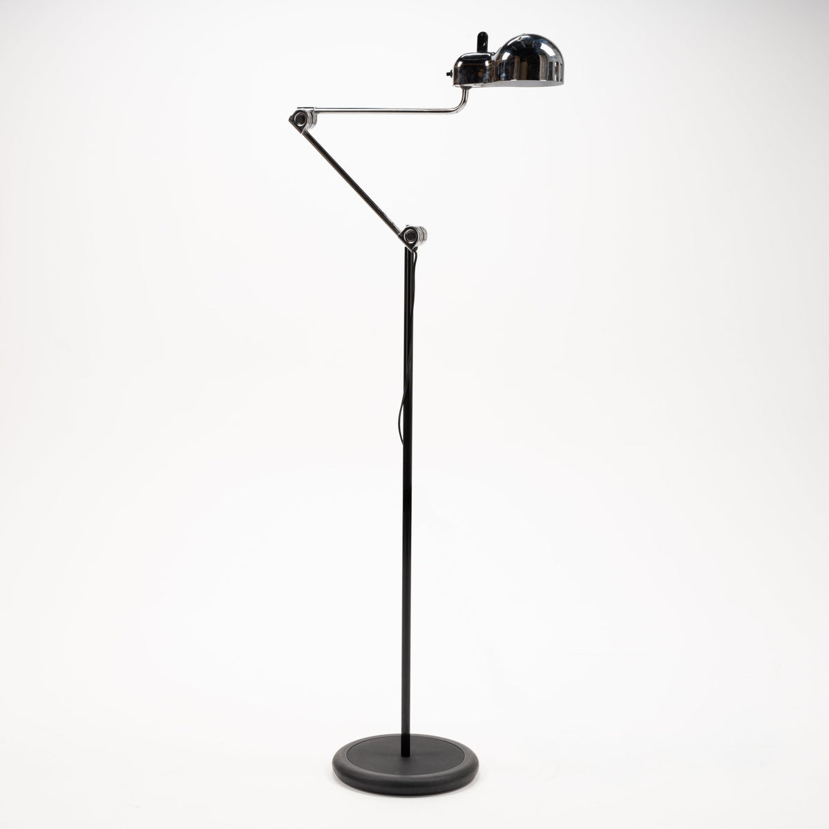Joe Colombo Chrome Topo Floor Lamp with polished chrome dome shade articulated arm slender black stem and round weighted base in modern lighting design