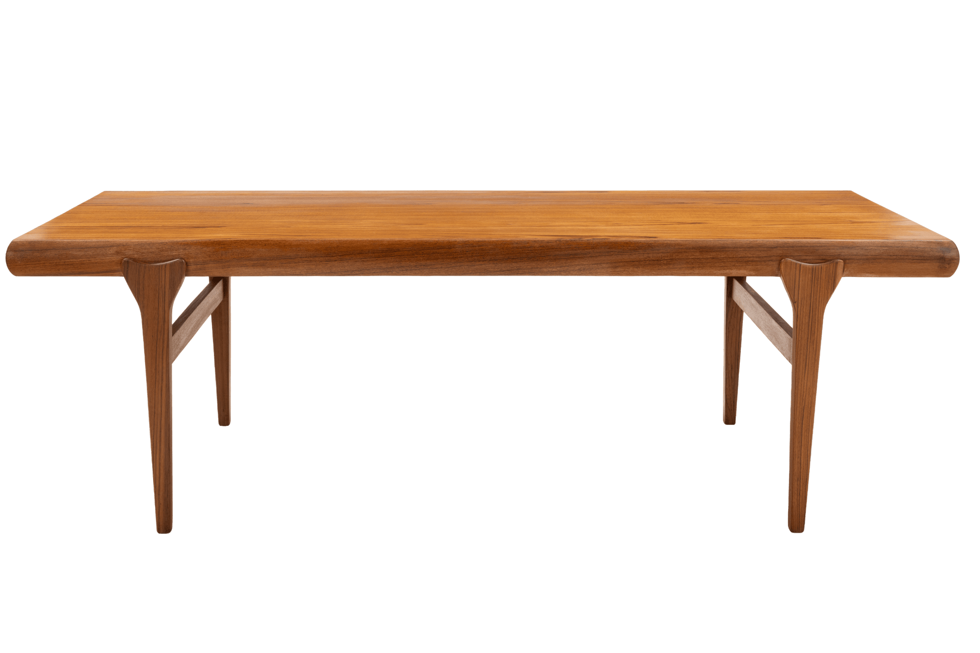 Rectangular teak coffee table with rounded edges and tapered legs showcasing Danish mid-century design craftsmanship
