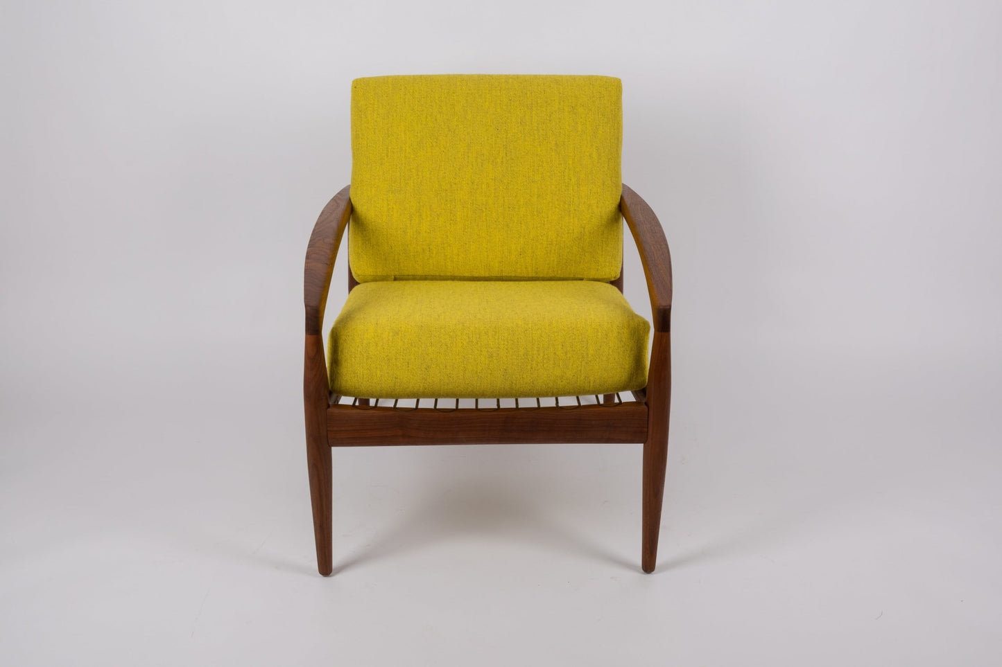 Kai Kristiansen 'Paper Knife' armchair with solid teak frame and mustard yellow cushions from 1950s Denmark.