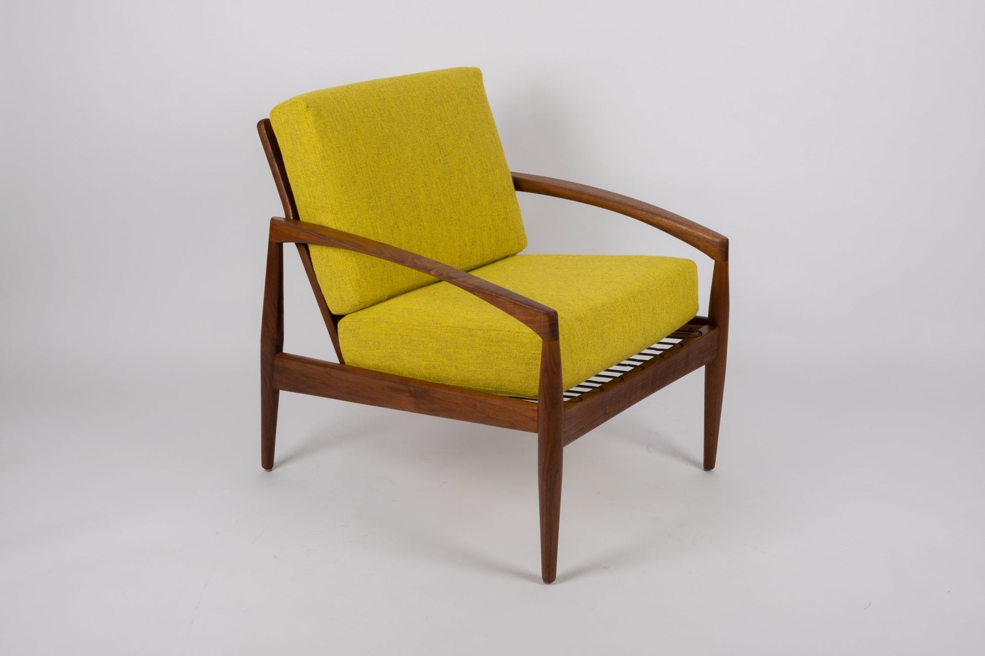 Kai Kristiansen 'Paper Knife' Danish teak armchair from the 1950s with yellow upholstery and slatted seat base