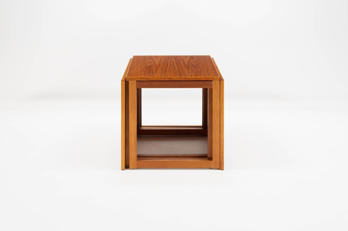 Set of three interlocking mid-century modern teak side tables “The Cube” by Kai Kristiansen from Denmark.