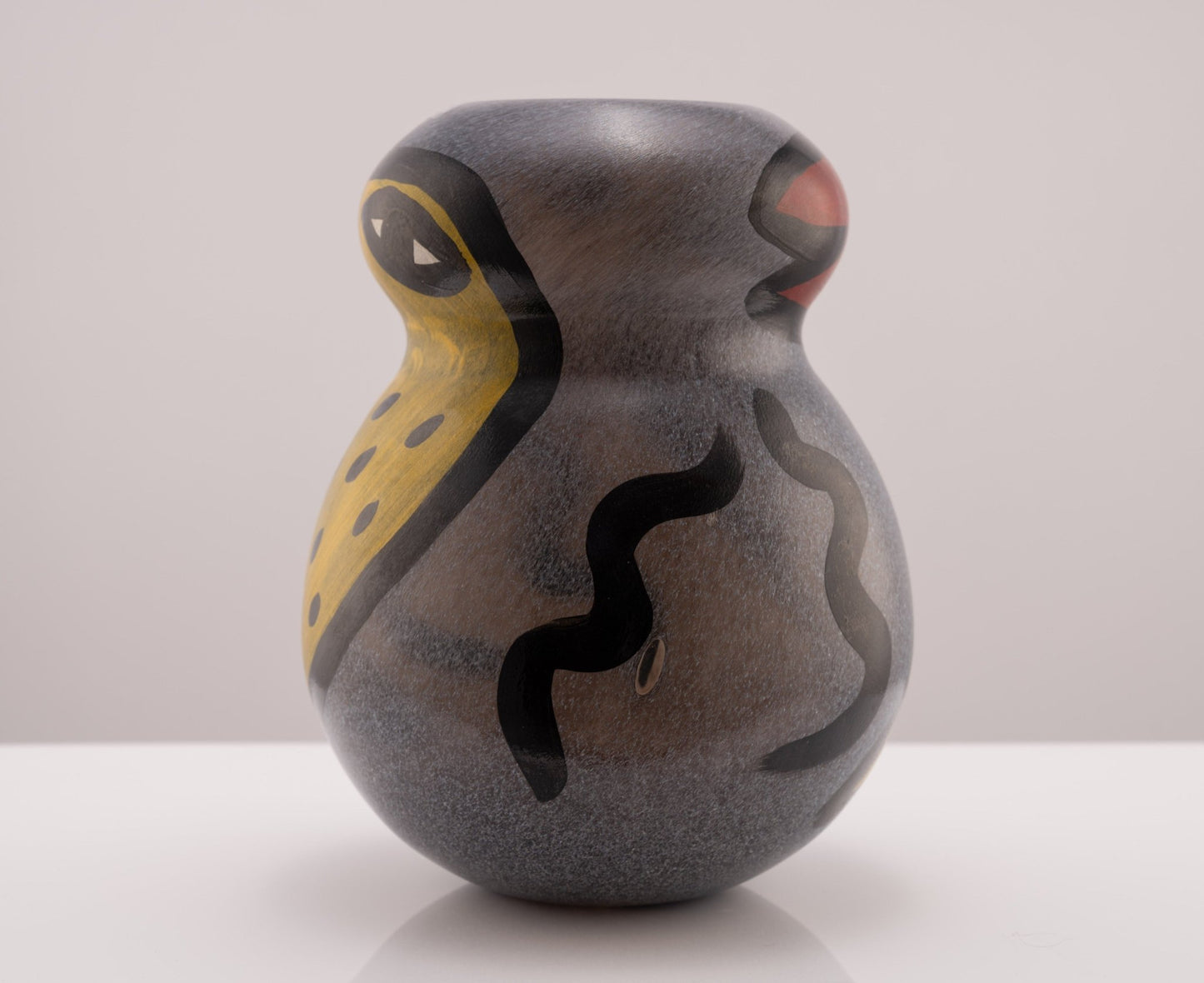Kosta Boda "Birdy Vase" designed by Ulrica Hydman-Vallien with bird and worm motifs and a clear opening for illumination