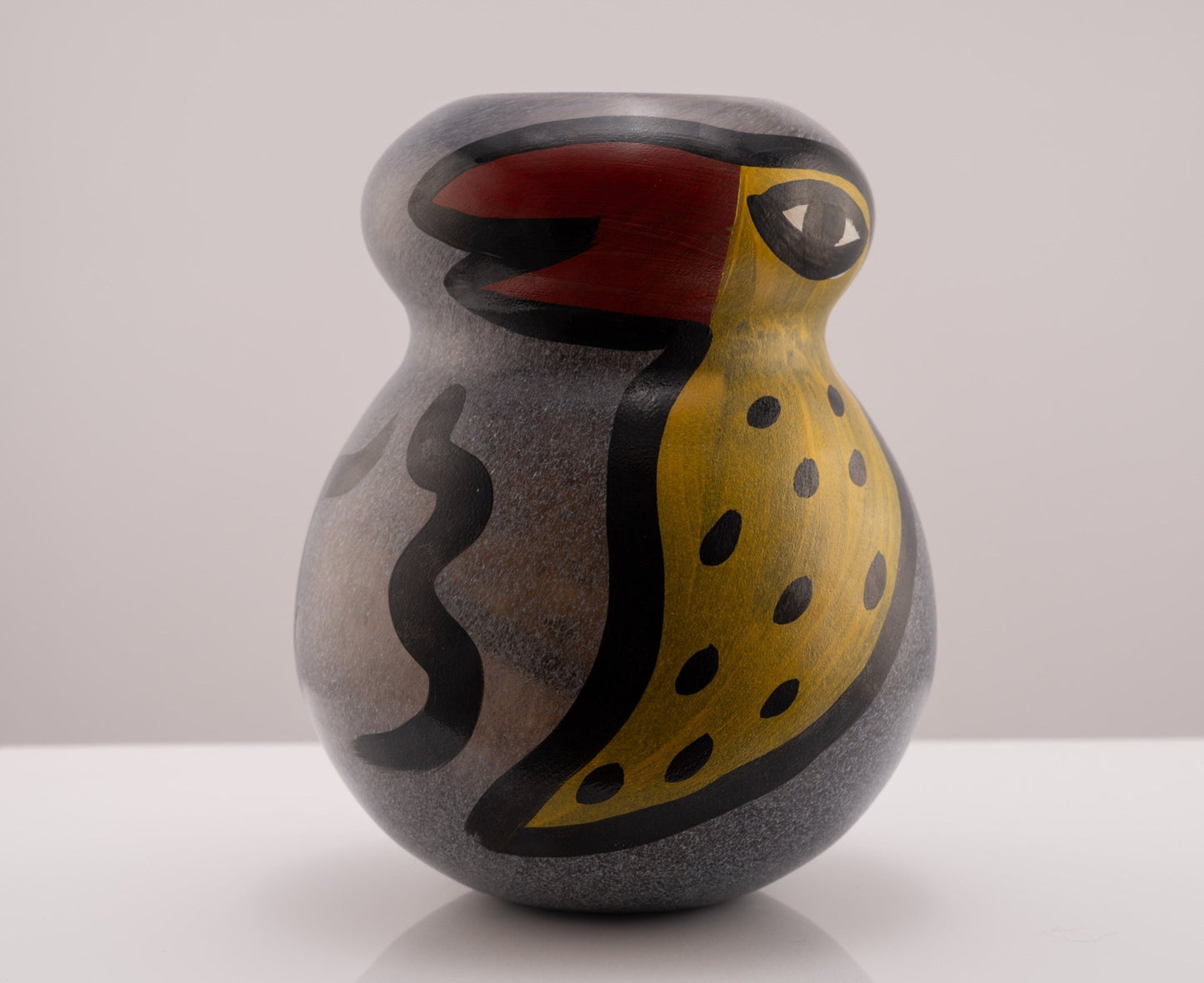 Kosta Boda Birdy Vase by Ulrica Hydman-Vallien with colorful bird and worm motifs on rounded glass form