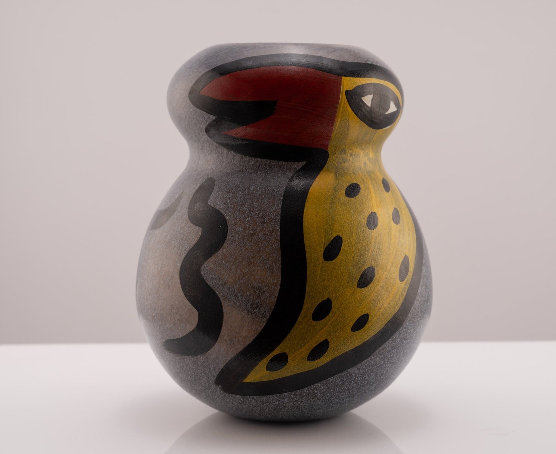 Kosta Boda Birdy Vase by Ulrica Hydman-Vallien with colorful bird and worm motifs on rounded glass form