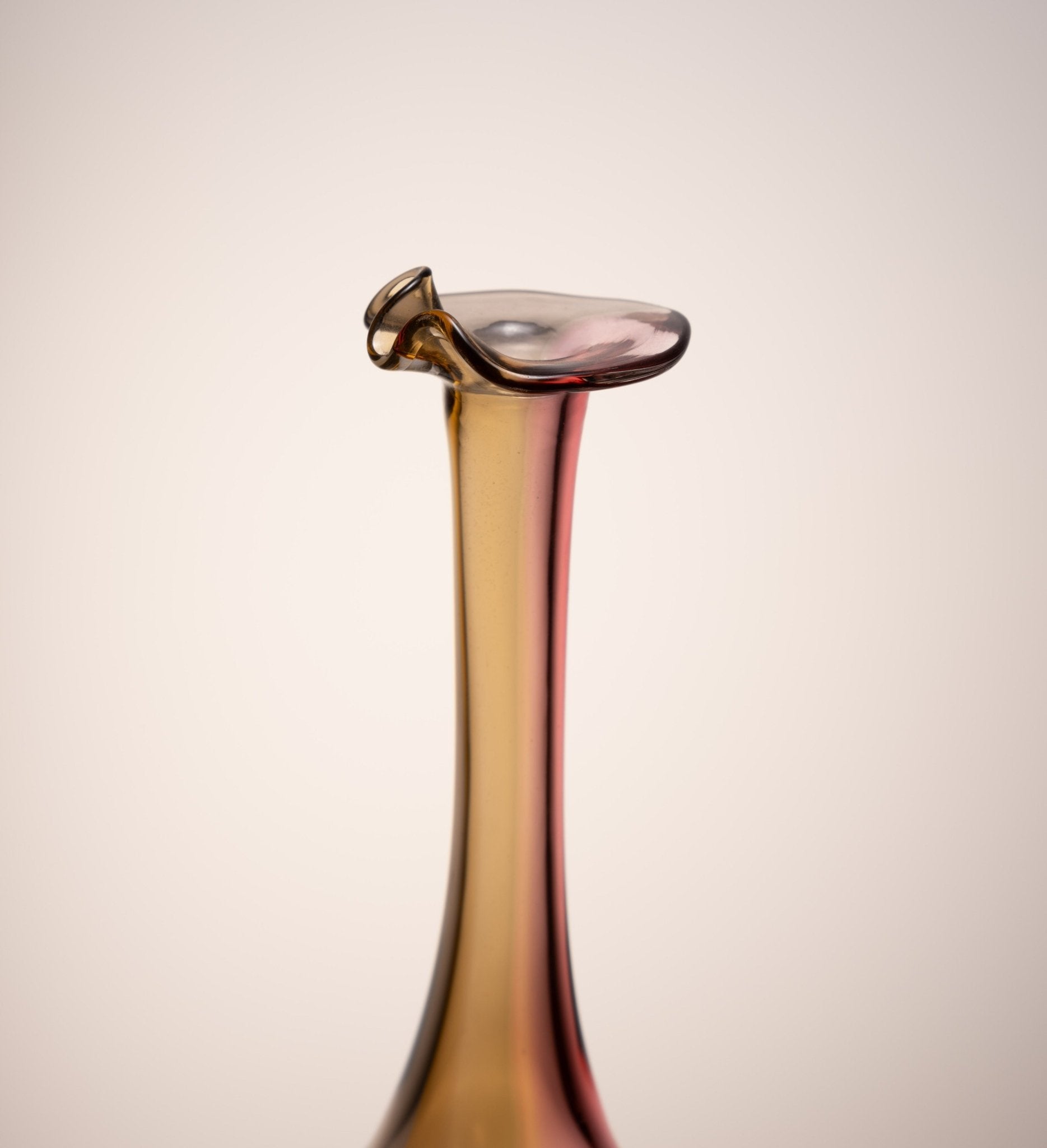 Kosta Boda Fidji glass vase with elongated neck and multicolored gradient, designed by Kjell Engman for Swedish glassworks