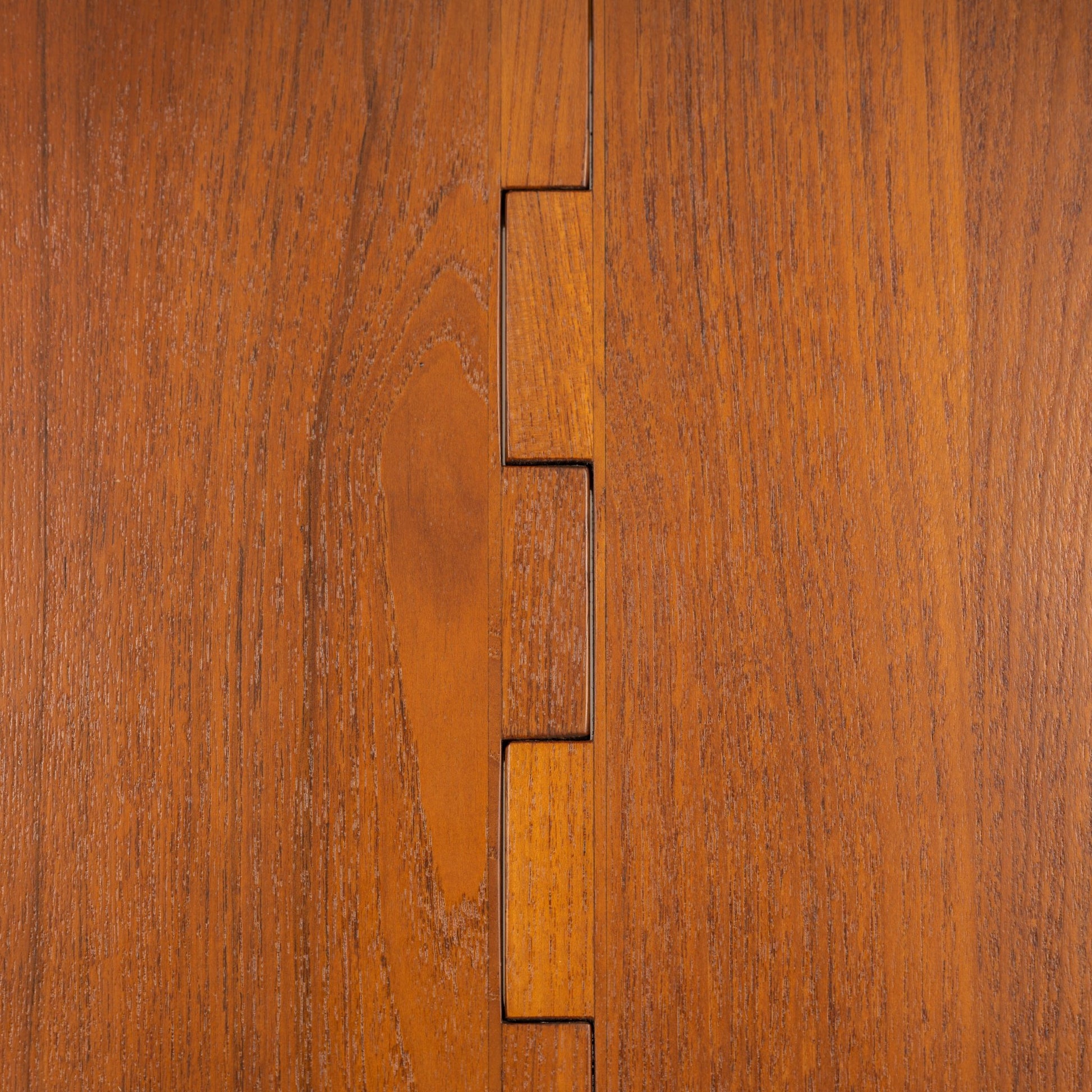 Kurt Ostervig Drop-Leaf Dining Table close detail of warm walnut surface and geometric leaf joinery showcasing crafted mid century modern furniture design