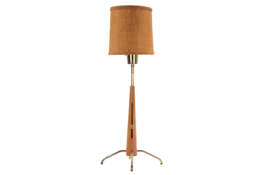 Manner of Josef Frank Table Lamp with slender wood stem linen drum shade and polished metal tripod base in mid century modern lighting