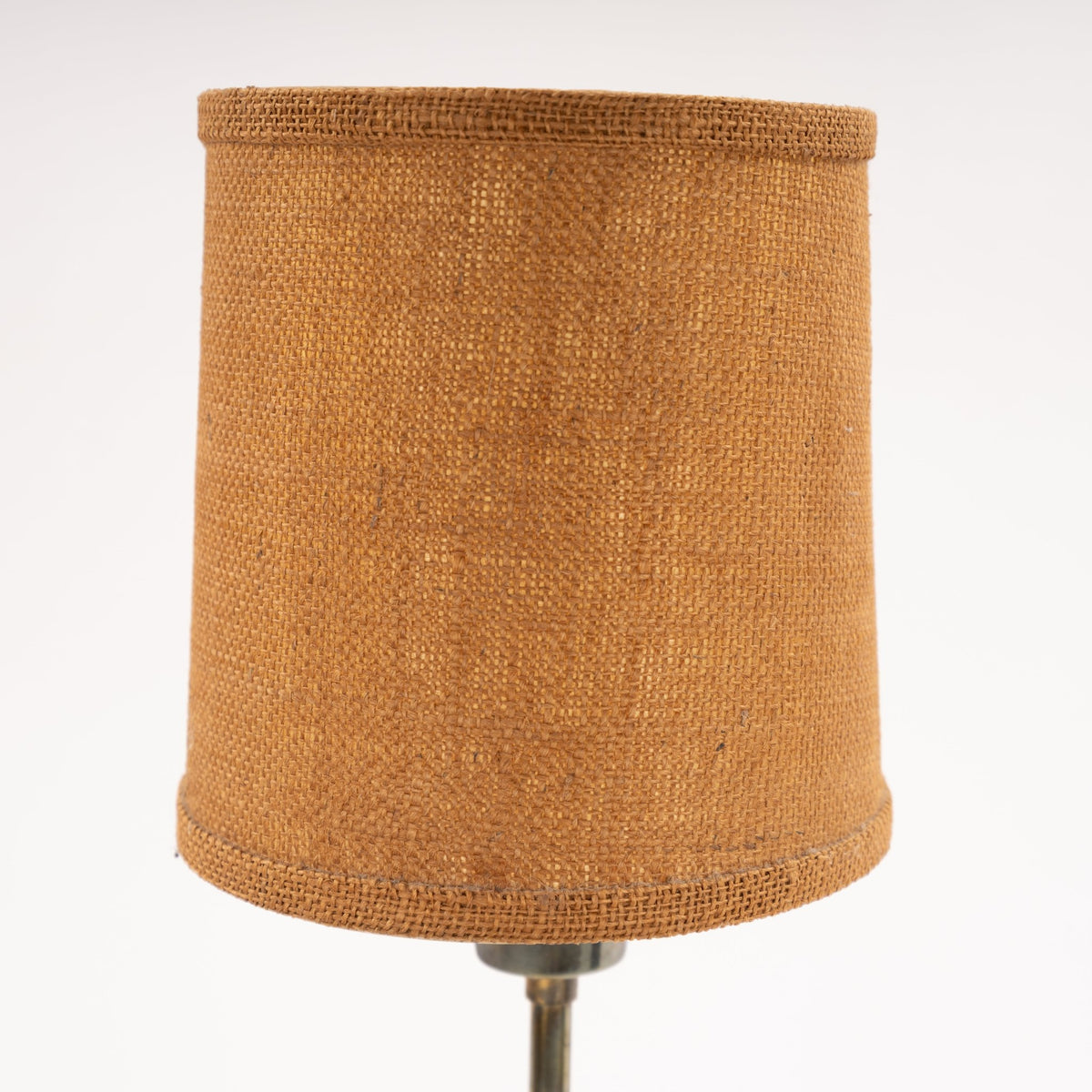 Manner of Josef Frank Table Lamp with woven burlap drum shade and brass stem detail in mid century modern lighting