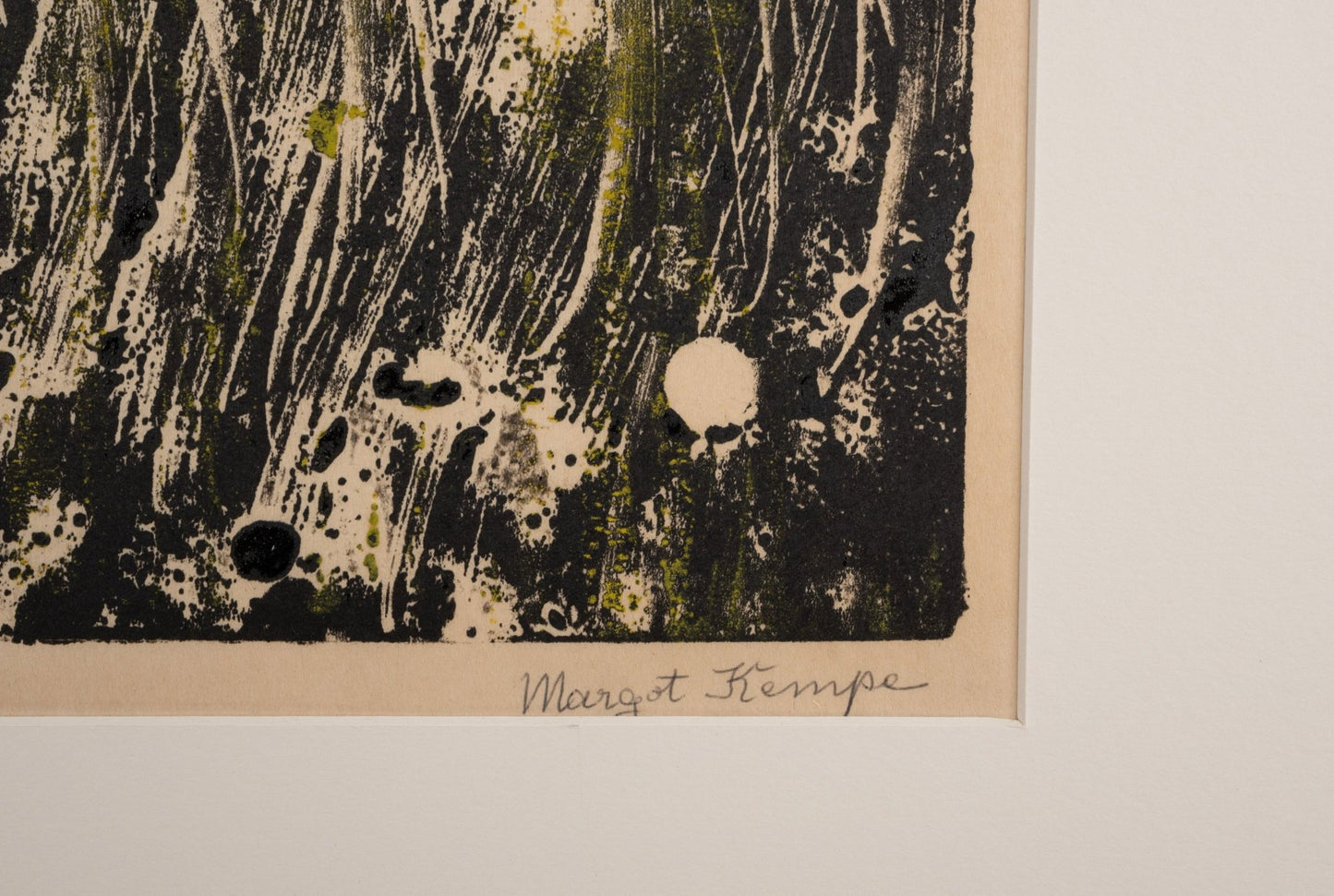 Close-up of Margot Kempe signed "Enchanted Forest" monotype print with abstract black and green textures on cream paper.