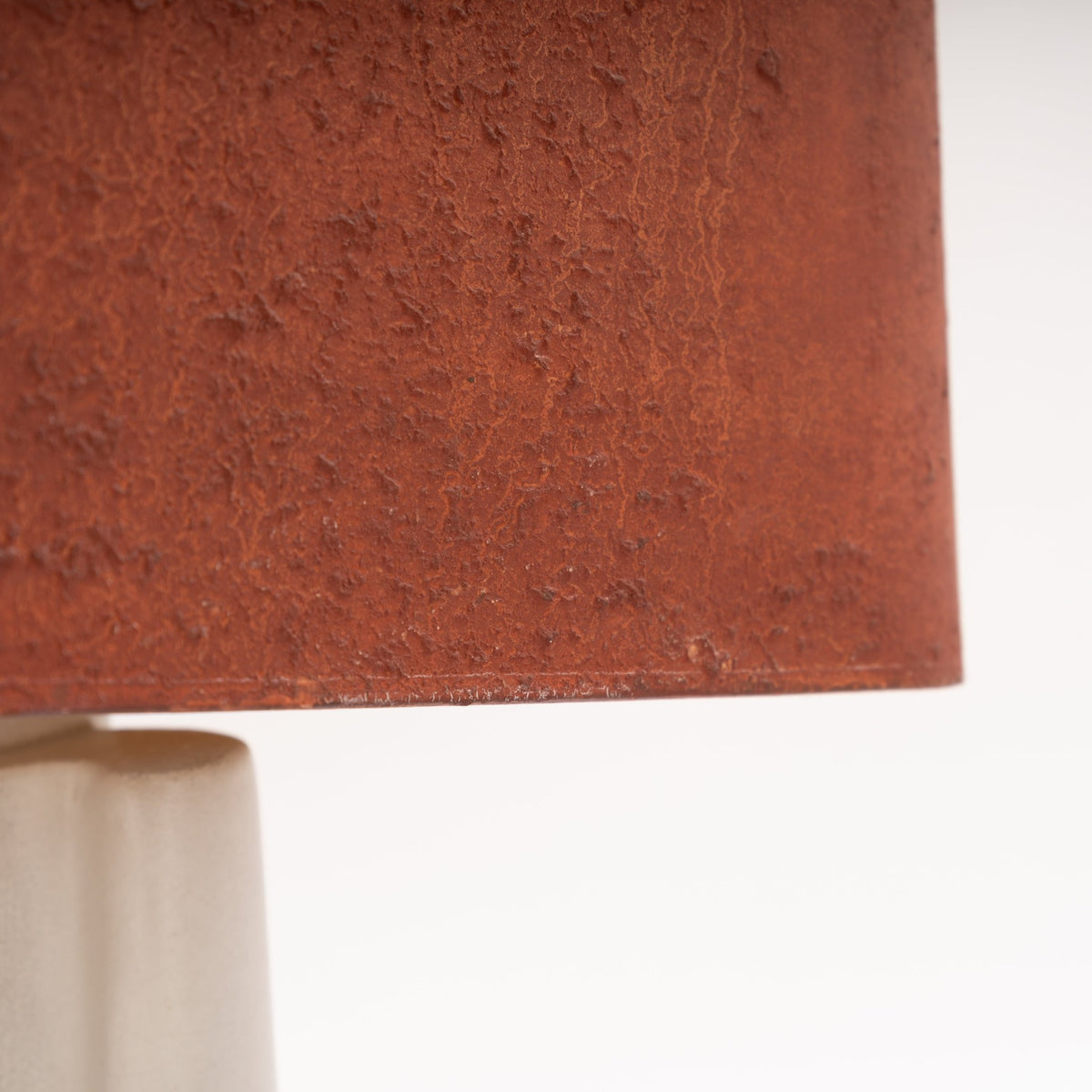 Marianna Von Allesch Table Lamp close up of a textured rust brown shade above a white ceramic base in mid century modern lighting
