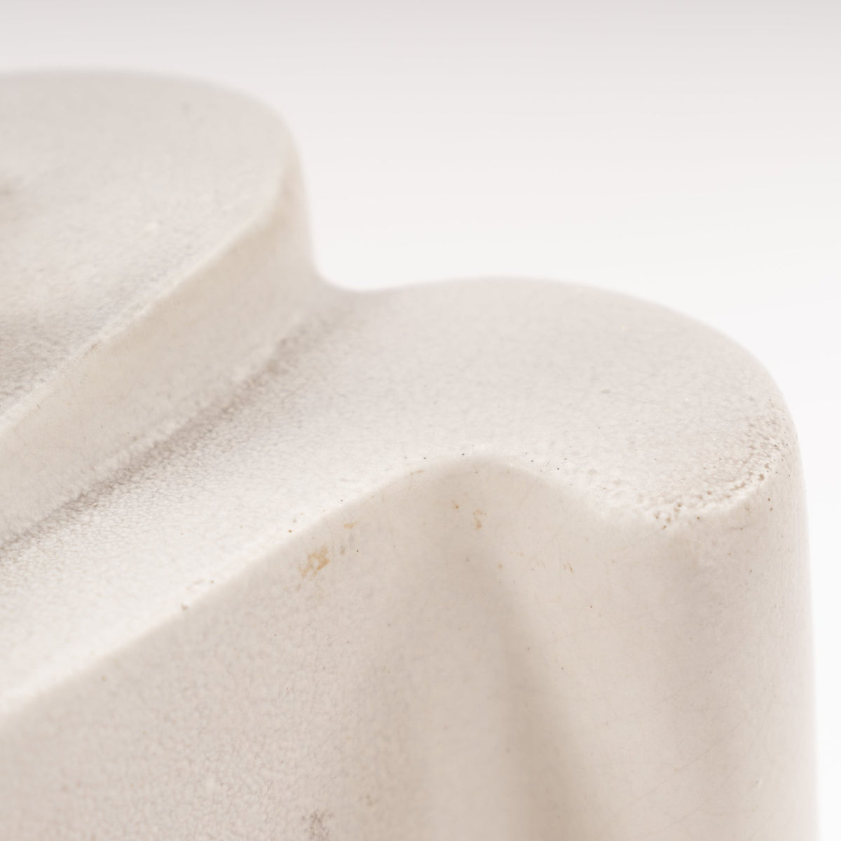 Marianna Von Allesch Table Lamp close-up of a softly textured white sculptural ceramic base with organic contours in mid century modern lighting