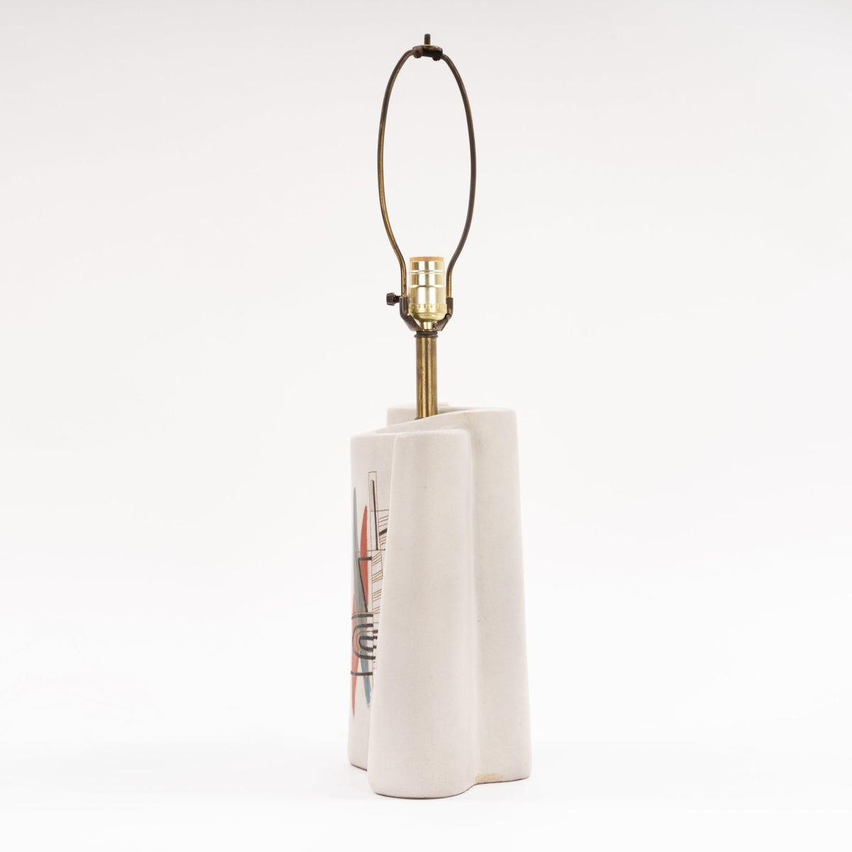 Marianna Von Allesch Table Lamp with a white sculptural ceramic base brass stem and exposed socket in minimalist mid century modern lighting