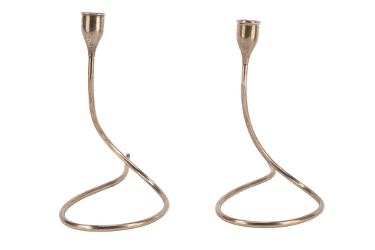 Pair of Marion Anderson sterling silver candlesticks with curved minimalist form and plastic accents on tips