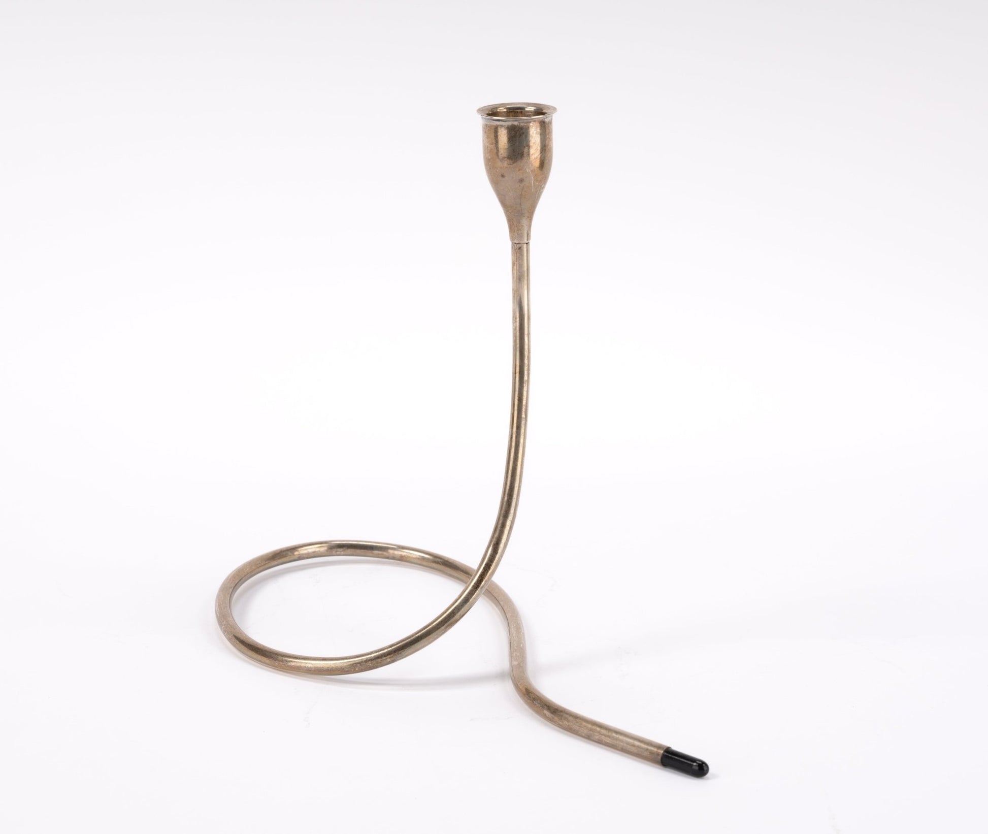 1950s Marion Anderson sterling silver candlestick with spiral base and black plastic tip on white background