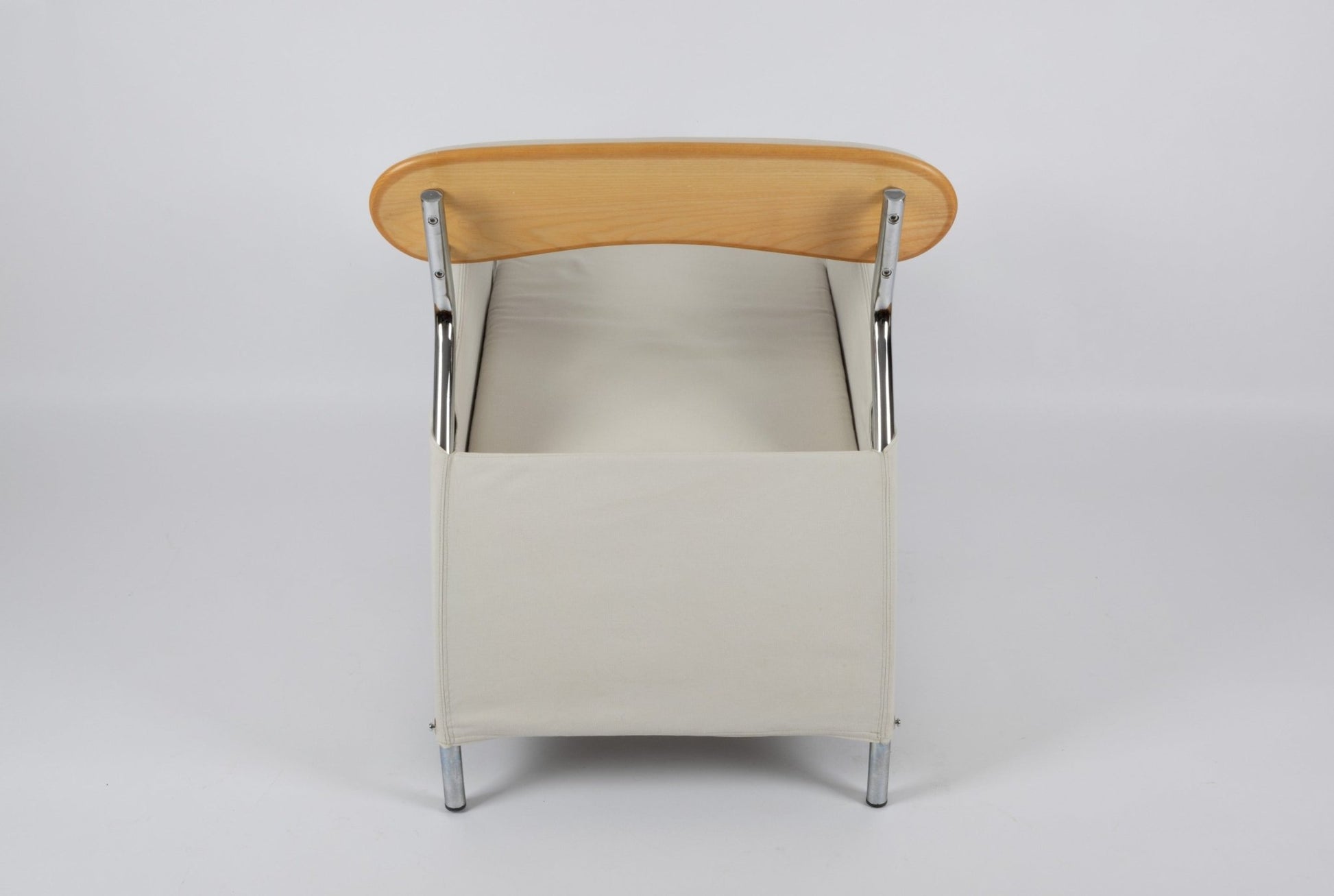 Pair of 1980s Massimo Iosa Ghini Memphis-style arm chairs with canvas seat, chrome frame, and wooden backrest from Italy.