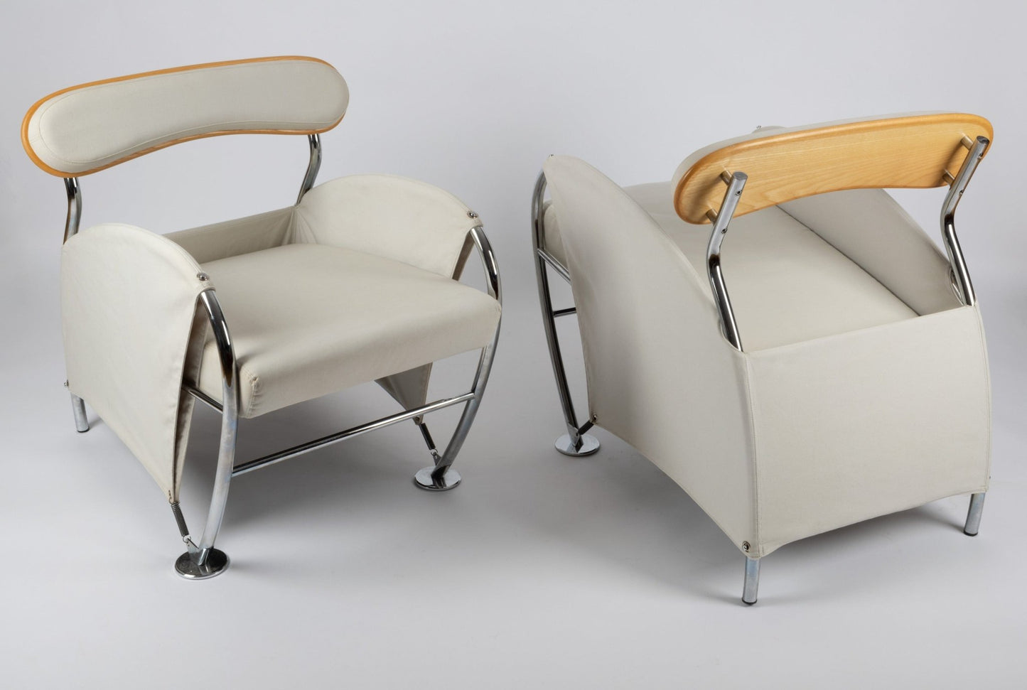Pair of 1980s Massimo Iosa Ghini Memphis-style armchairs with beige canvas and chrome frames from Italy.