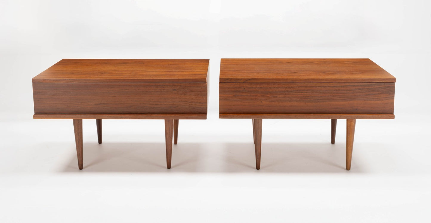 Pair of mid-century modern walnut side tables by Mel Smilow with rectangular tops, single drawers, and tapered legs