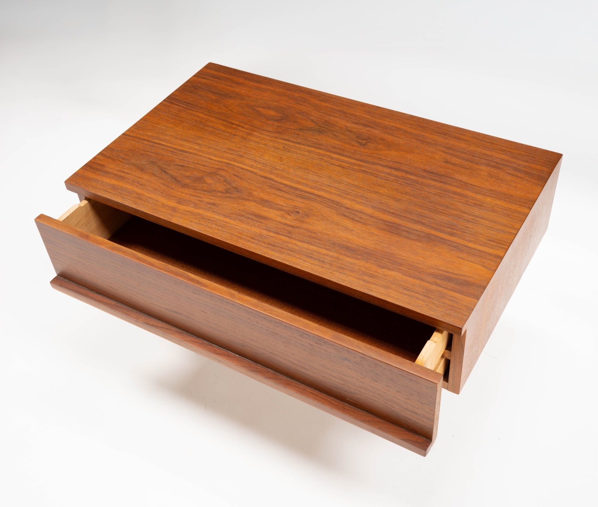 Mid-century walnut side table drawer designed by Mel Smilow with clean rectangular form and minimalist style.