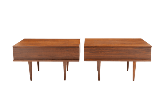 Pair of mid-century walnut side tables with clean rectangular form and single front drawer and classic tap