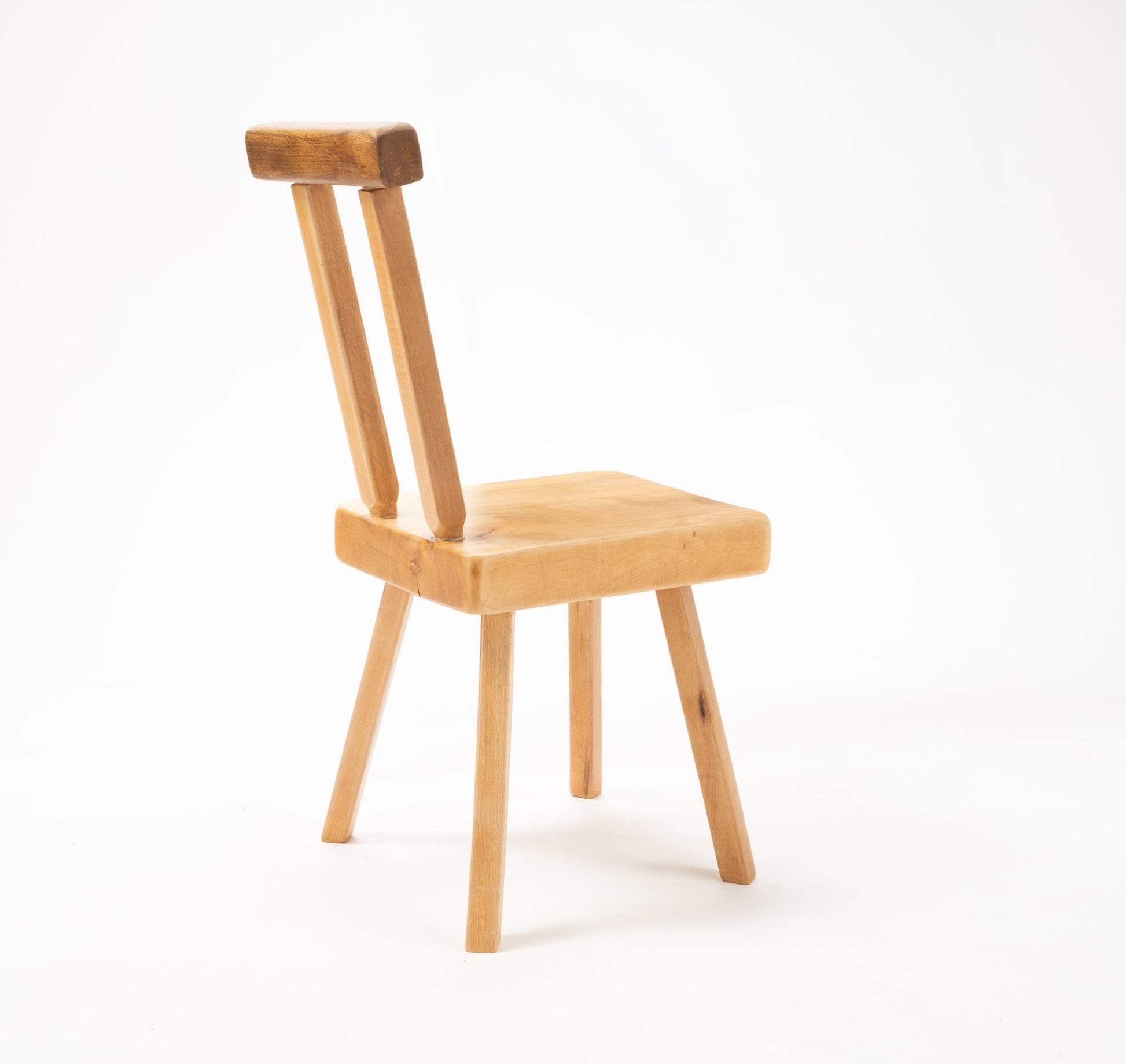 Mobichalet Brutalist oversized pine wood chair with simple geometric form and angled legs on white background