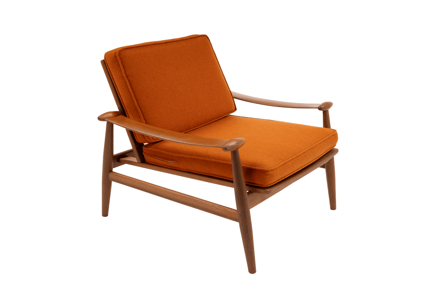 Mid-century modern Finn Juhl Spade Armchair with sculpted teak frame and burnt orange upholstered cushions