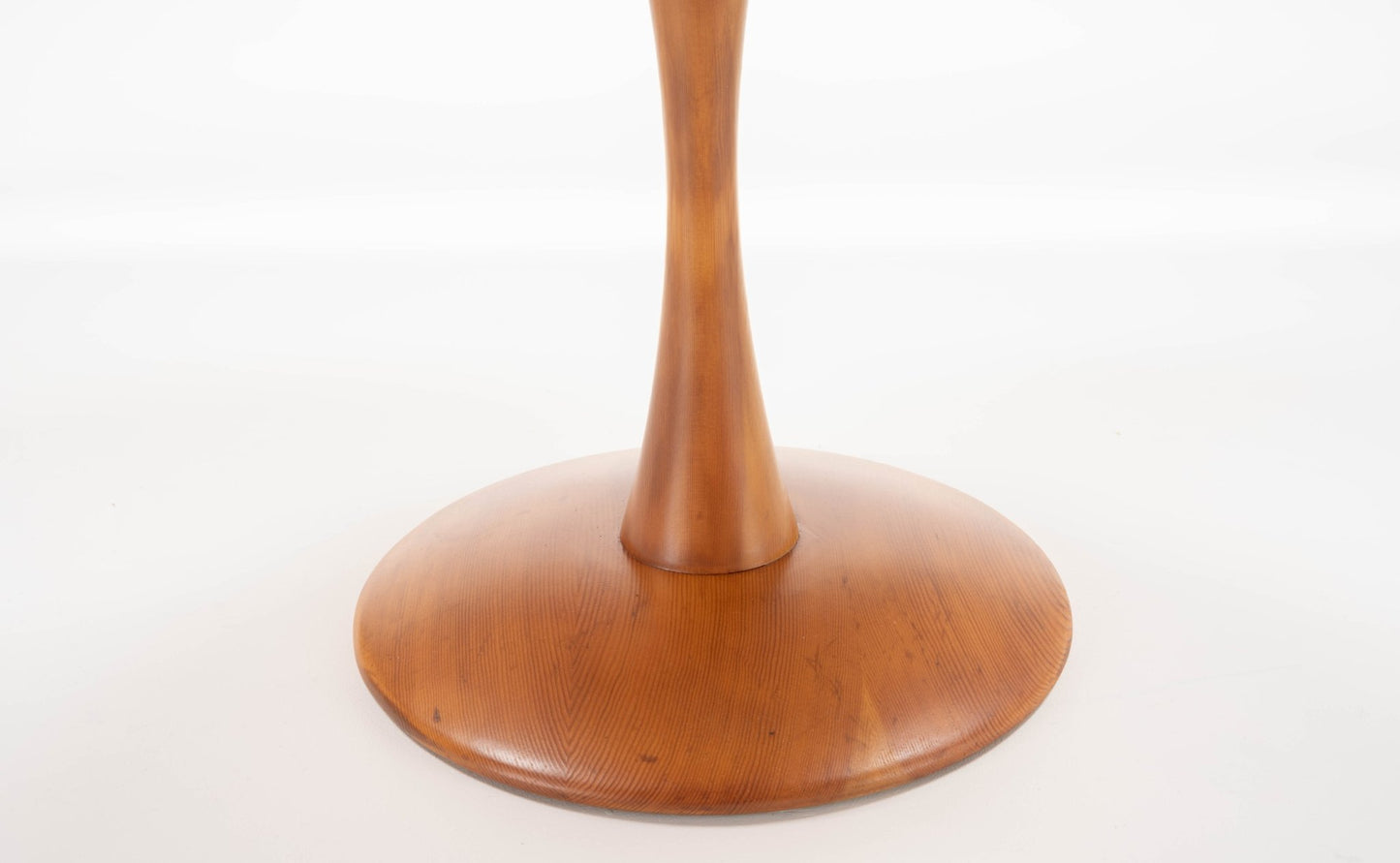 Base of Nanna Ditzel Pine Table in warm-toned Oregon pine with smooth rounded design and minimalist craftsmanship
