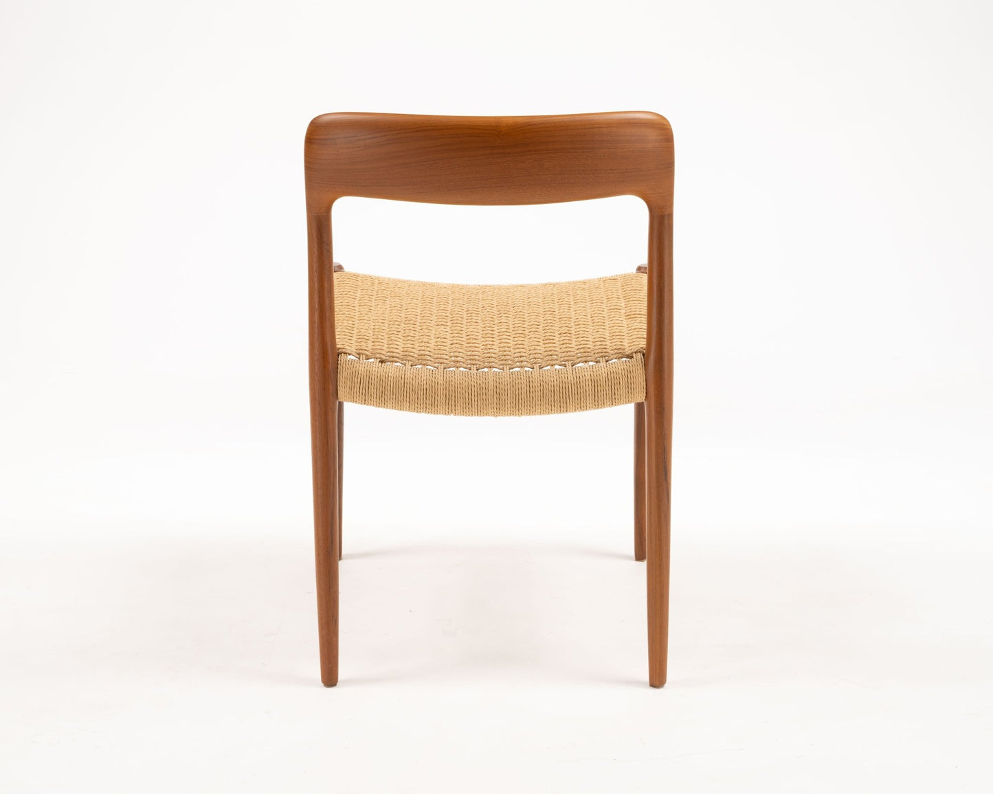 Rear view of Niels Otto Moller teak dining chair with woven papercord seat from 1960s Denmark