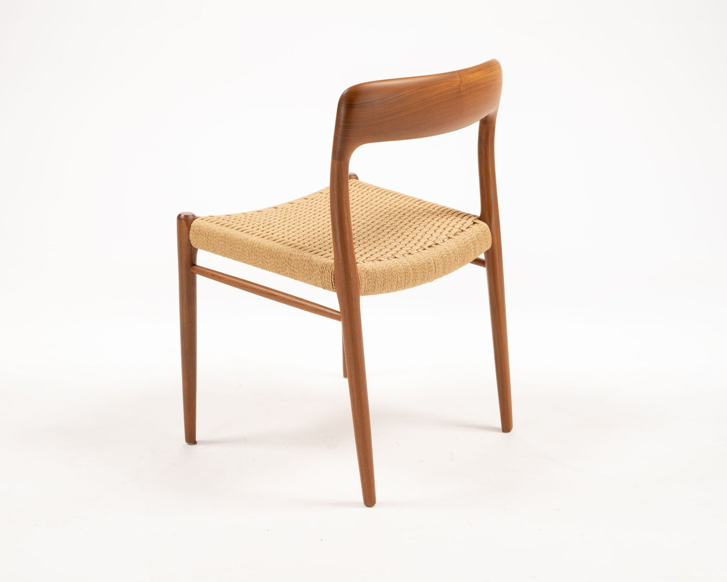 Single Niels Otto Moller teak dining chair with woven papercord seat from the 1960s Danish design.