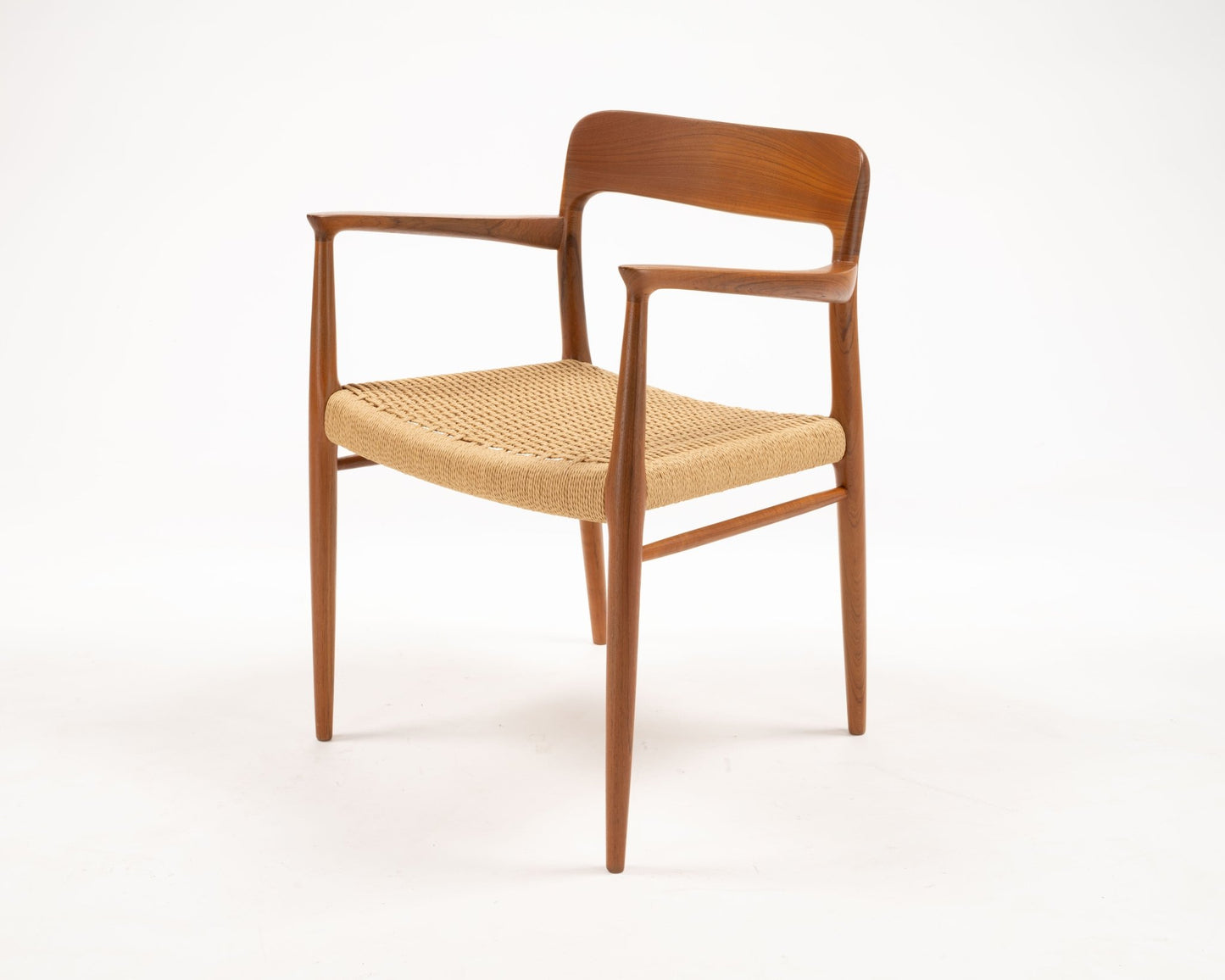 Niels Otto Moller Model 75 Danish teak dining chair with woven papercord seat from the 1960s.