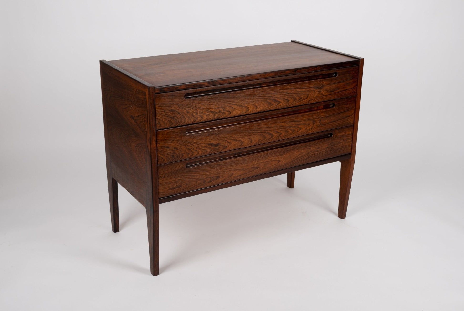 1960s Nils Jonsson Danish chest of drawers with recessed handles and tapered legs by HJN Mobler